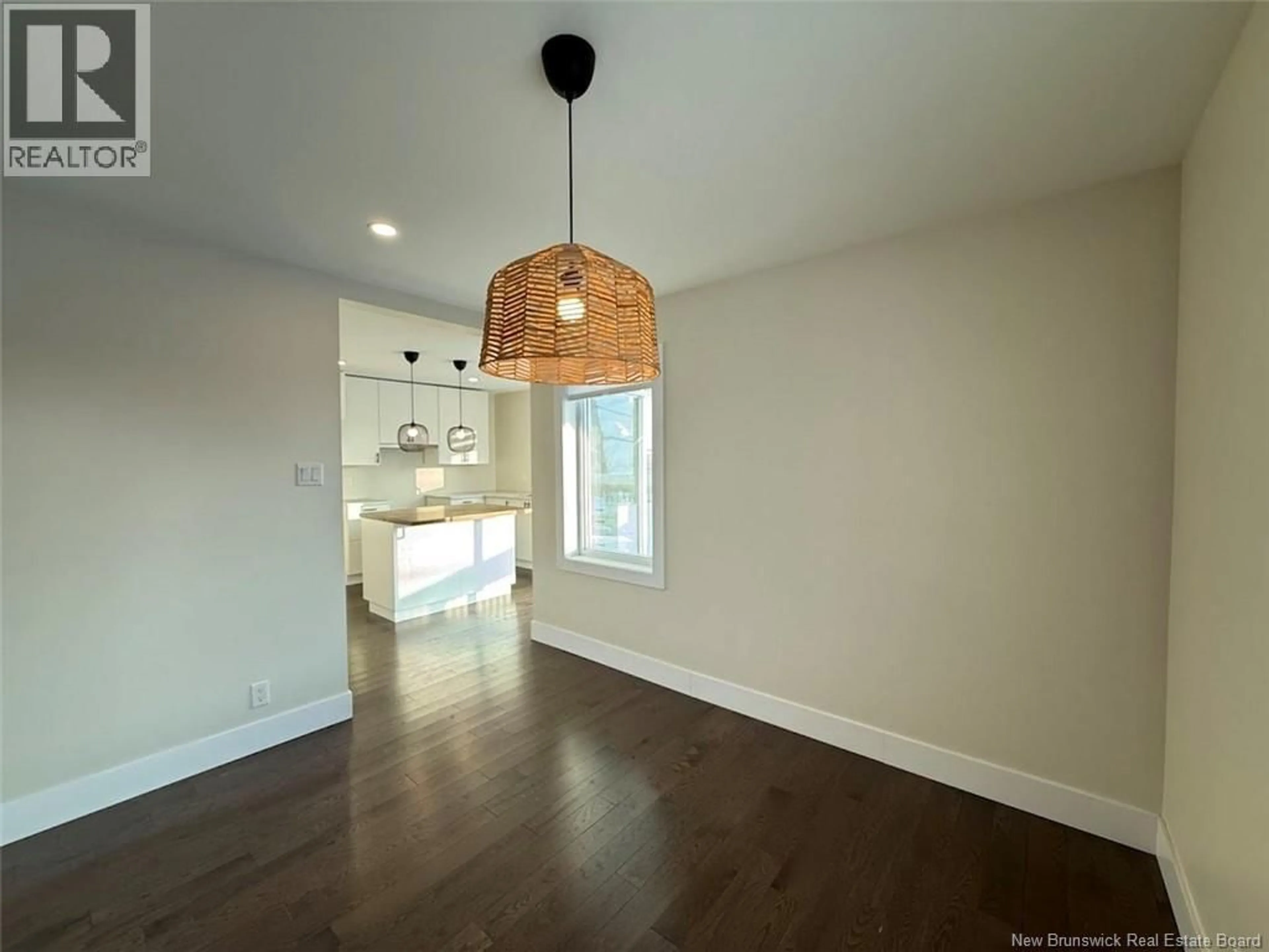 Open concept kitchen, wood/laminate floor for 17 CORMIER STREET, Edmundston New Brunswick E3V4S7