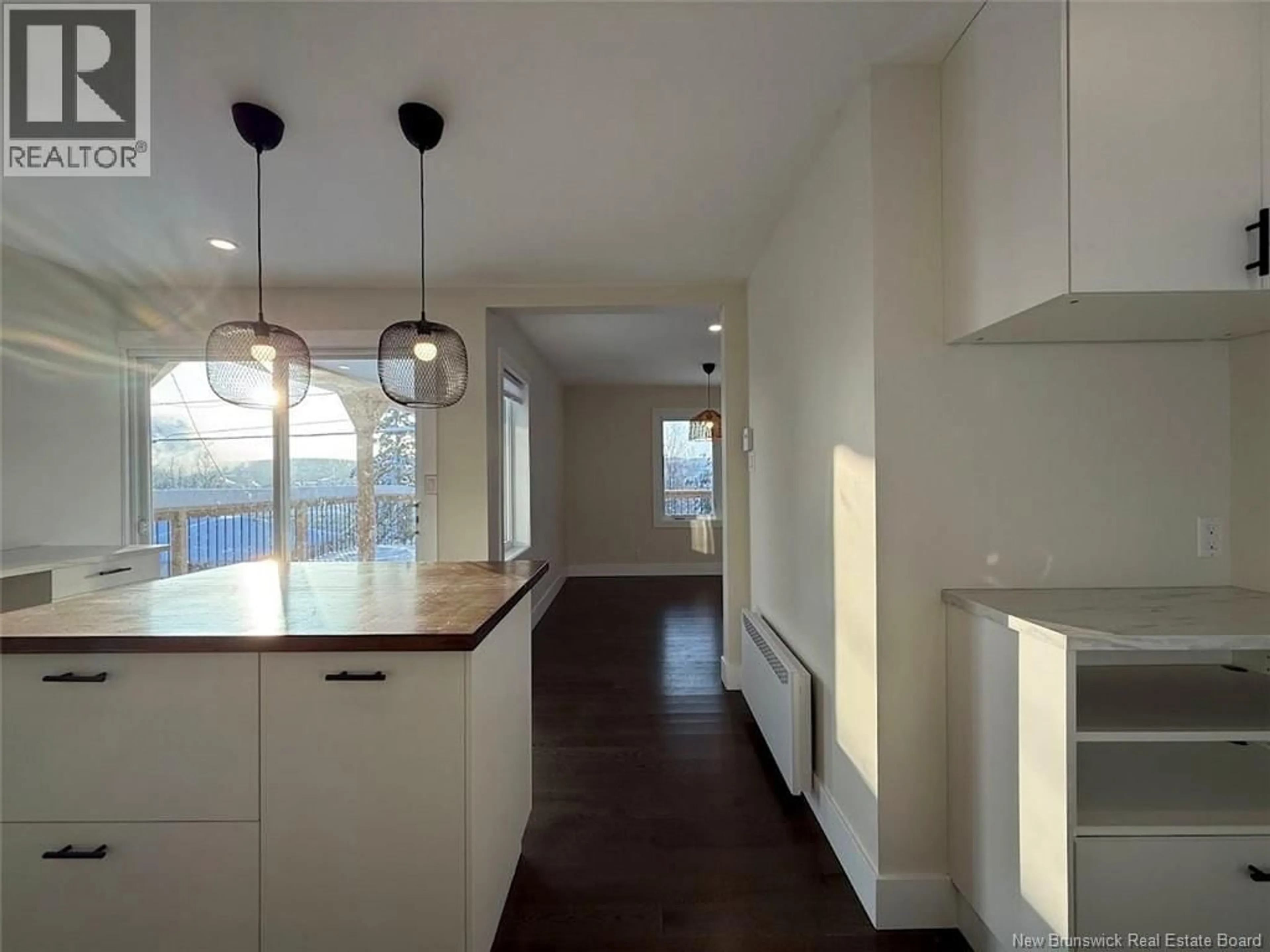 Open concept kitchen, unknown for 17 CORMIER STREET, Edmundston New Brunswick E3V4S7