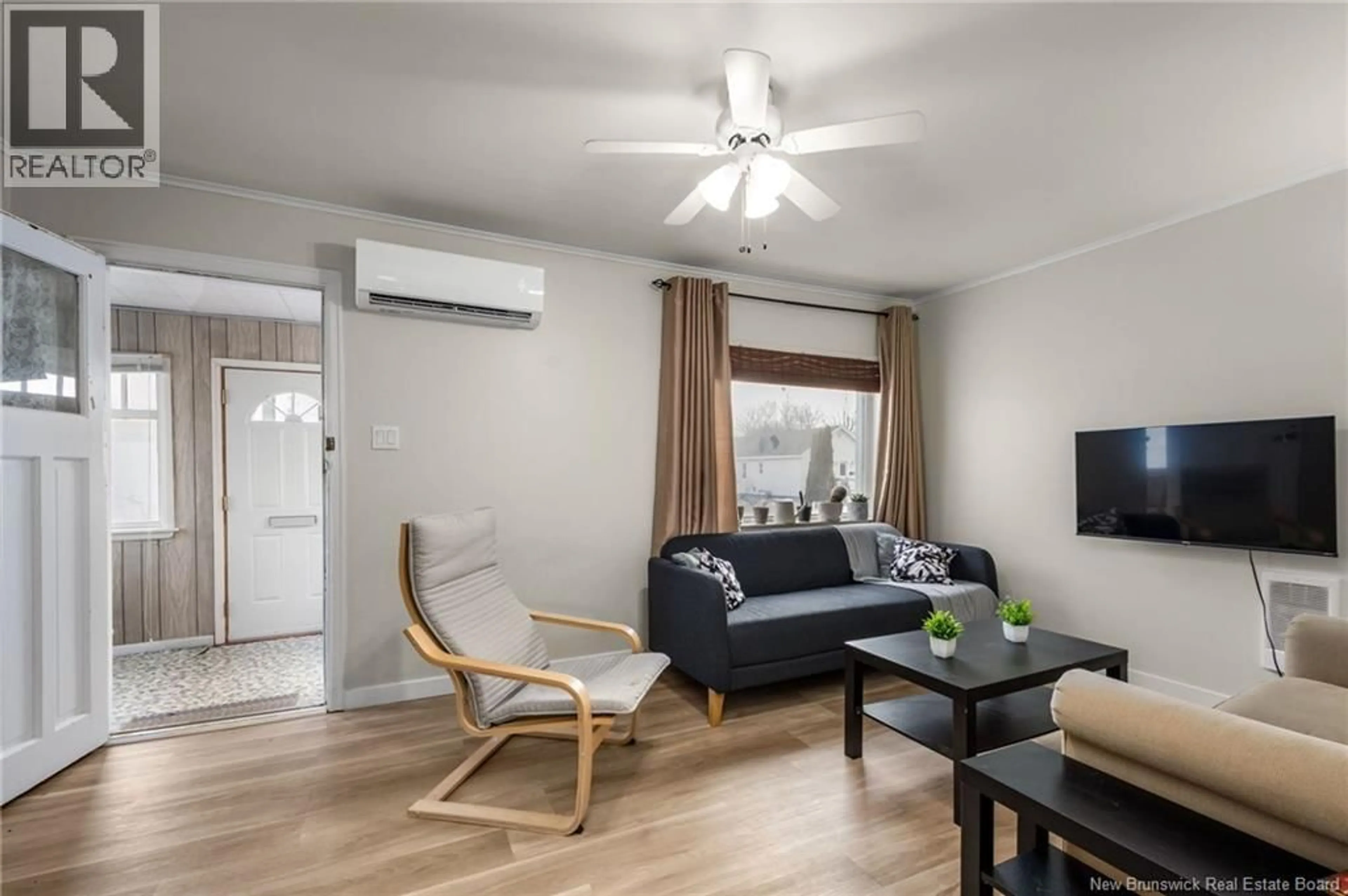 Living room with furniture, wood/laminate floor for 130 SALTER AVENUE, Moncton New Brunswick E1C7R7