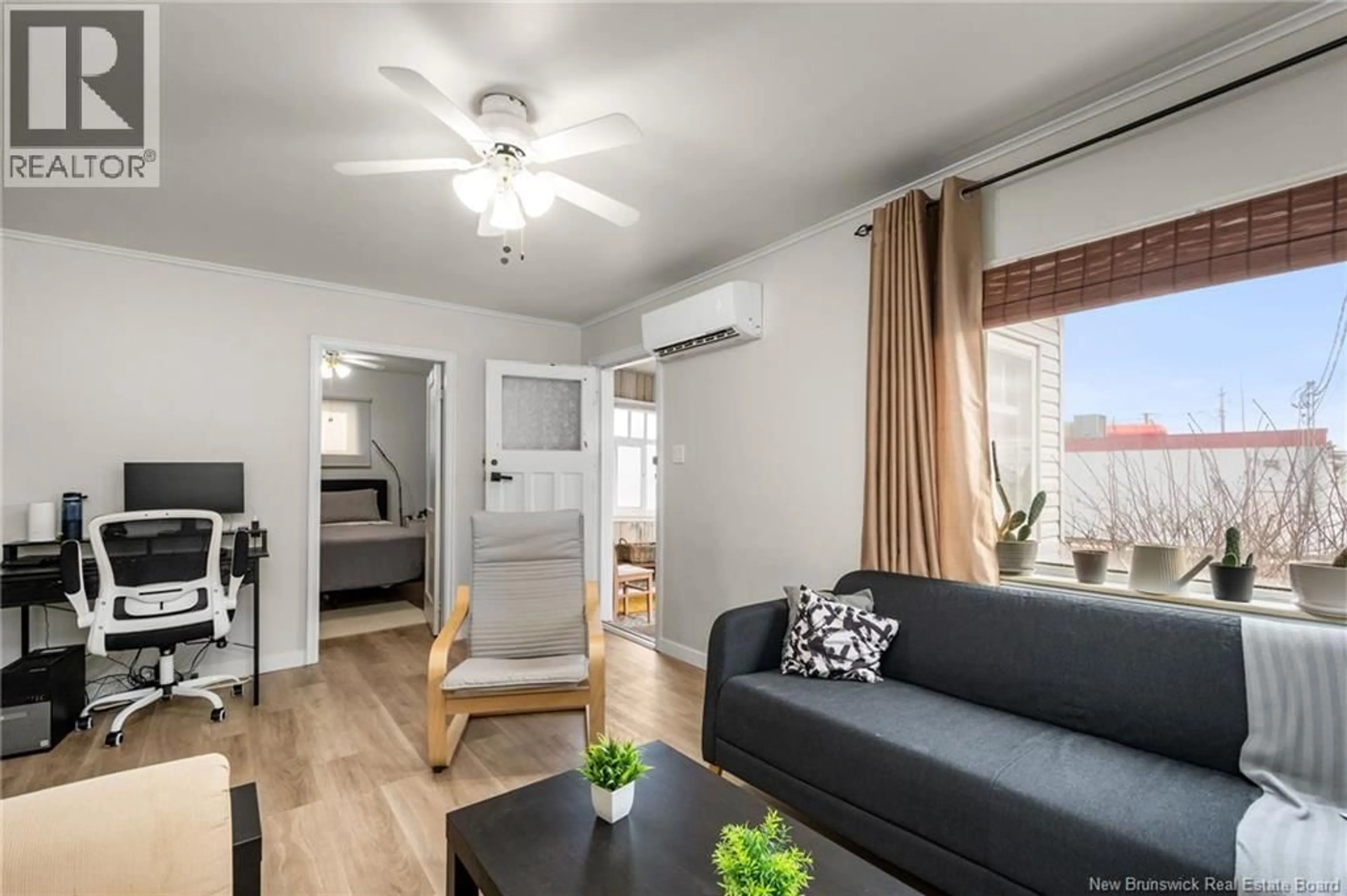 Living room with furniture, wood/laminate floor for 130 SALTER AVENUE, Moncton New Brunswick E1C7R7