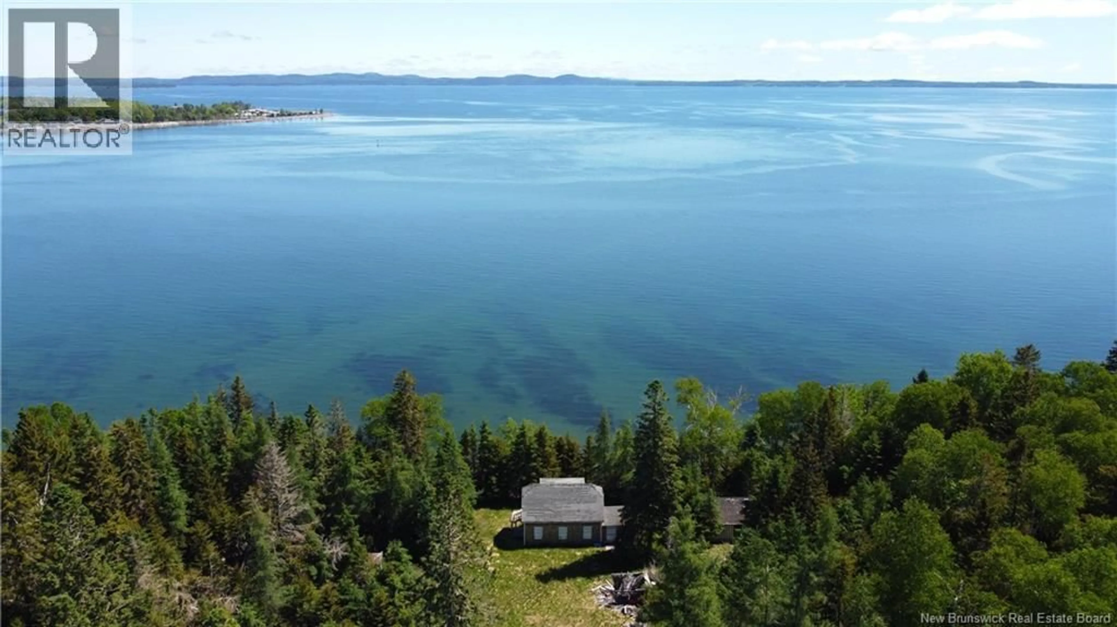 A pic from outside/outdoor area/front of a property/back of a property/a pic from drone, water/lake/river/ocean view for NAVY ISLAND, Saint Andrews New Brunswick E5B2H1