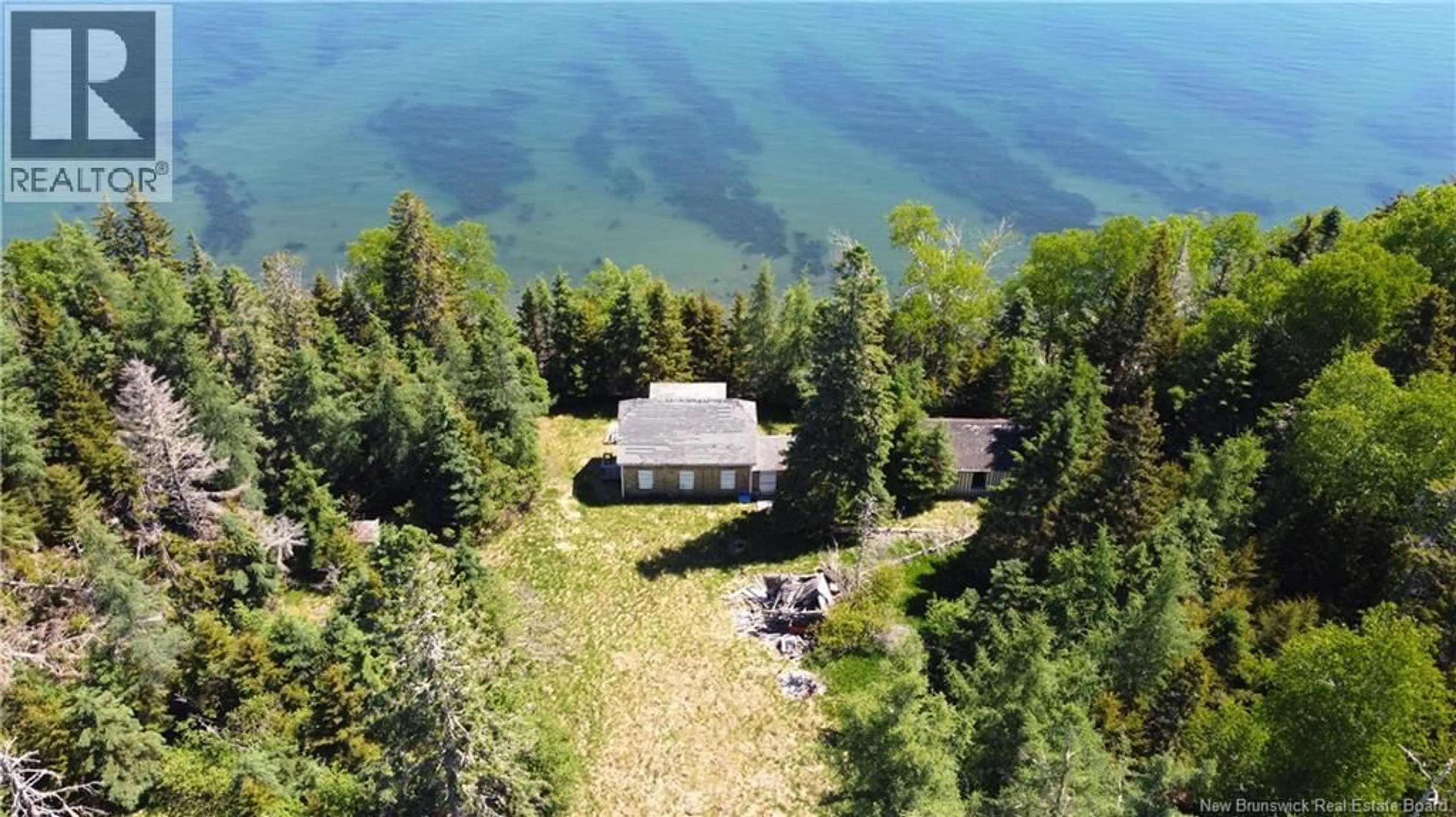 A pic from outside/outdoor area/front of a property/back of a property/a pic from drone, water/lake/river/ocean view for NAVY ISLAND, Saint Andrews New Brunswick E5B2H1