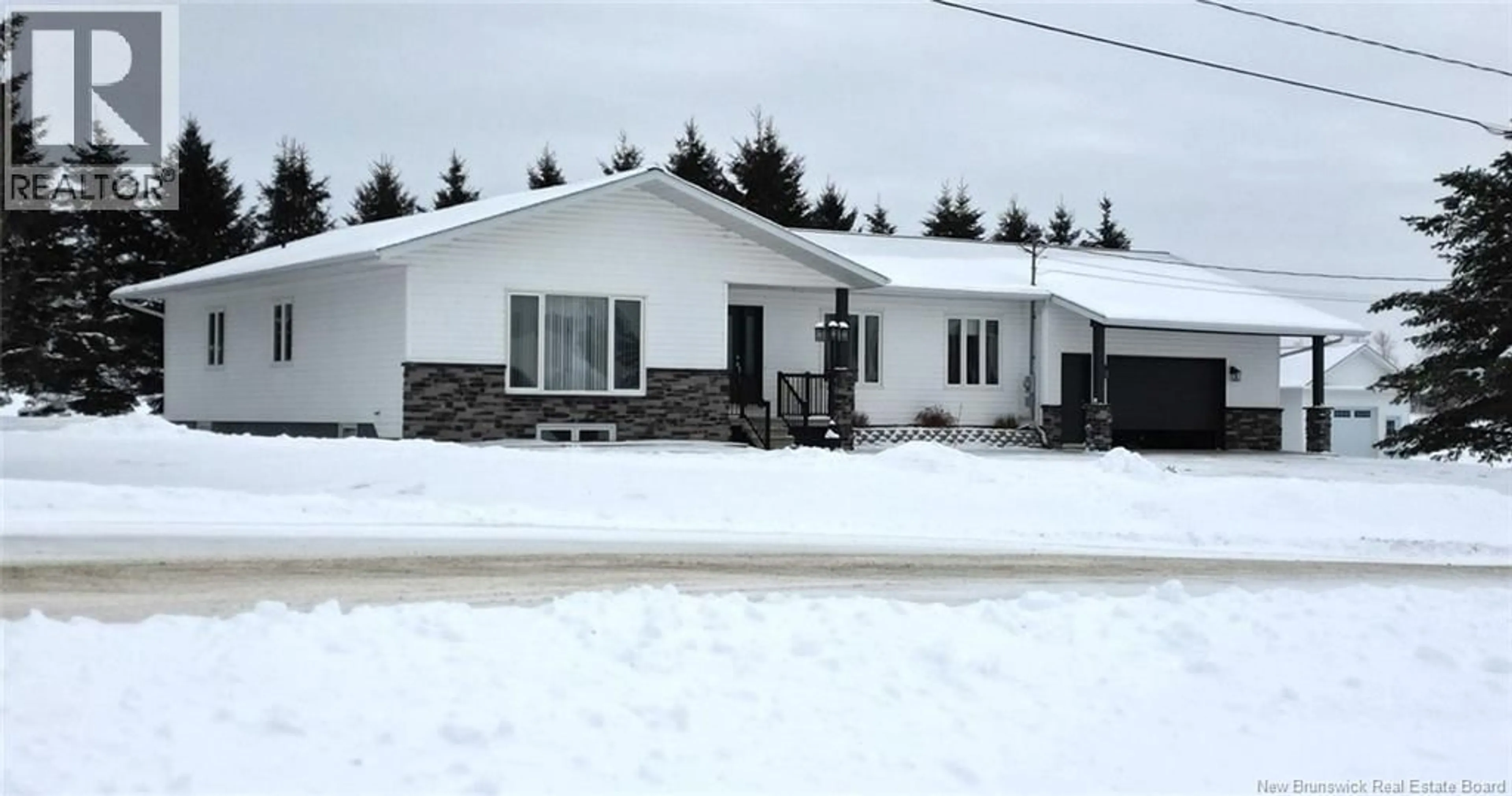 Home with vinyl exterior material, street for 19 5TH AVE, Saint-André New Brunswick E3Y3M2