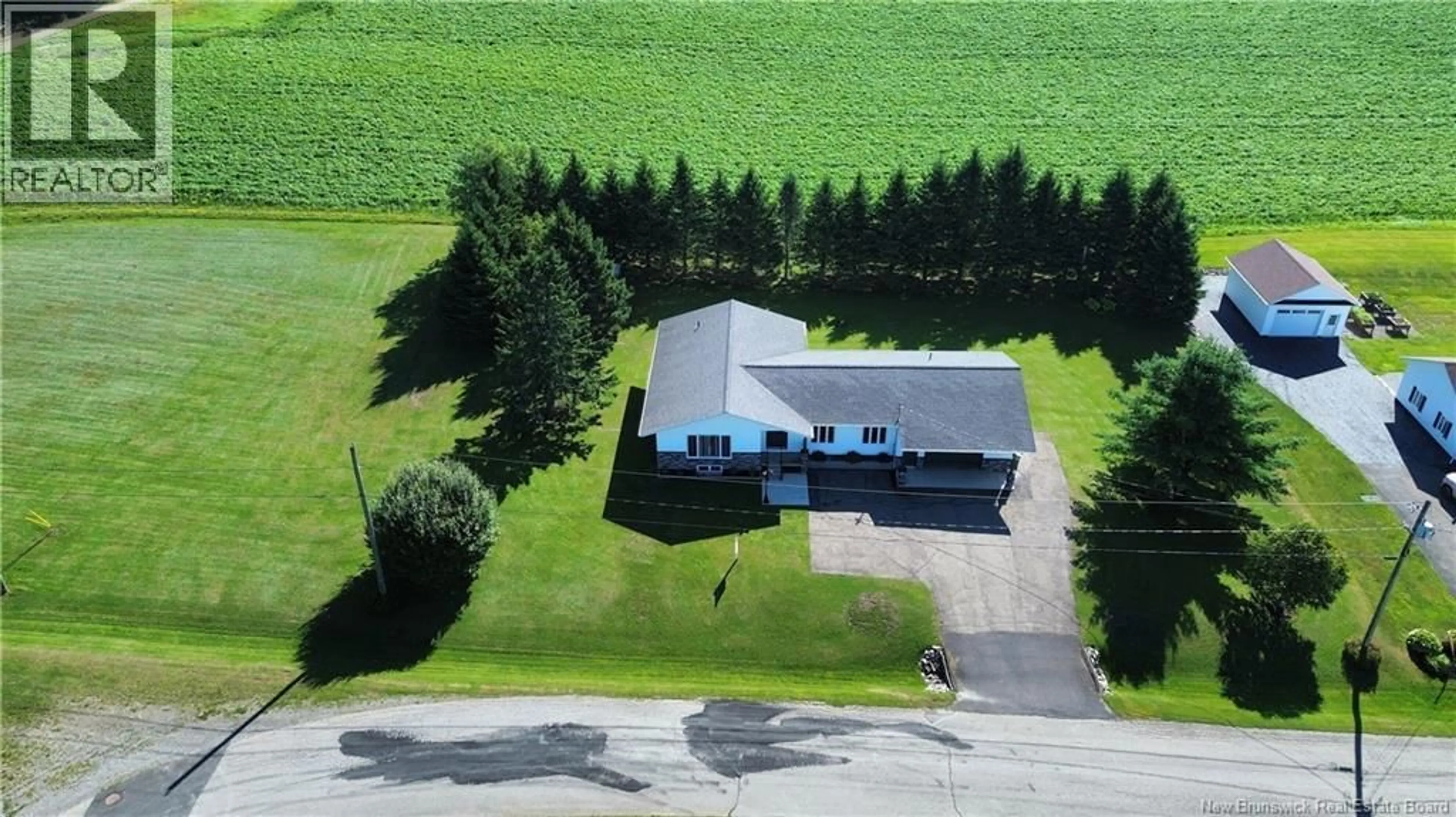 A pic from outside/outdoor area/front of a property/back of a property/a pic from drone, building for 19 5TH AVE, Saint-André New Brunswick E3Y3M2