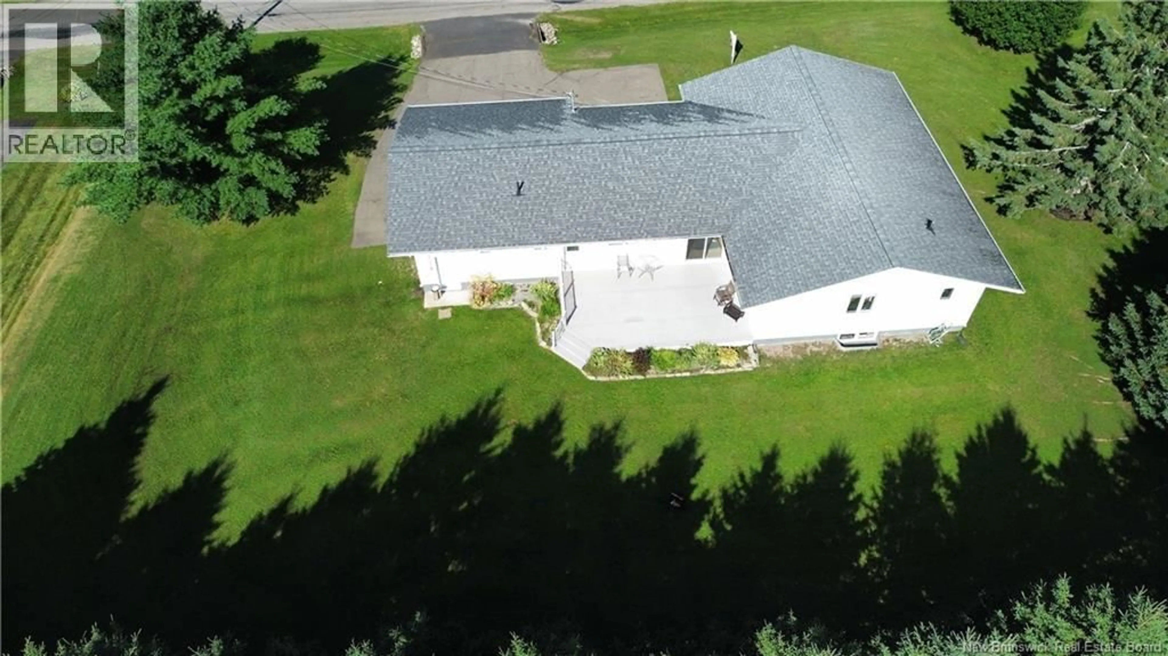 A pic from outside/outdoor area/front of a property/back of a property/a pic from drone, unknown for 19 5TH AVE, Saint-André New Brunswick E3Y3M2