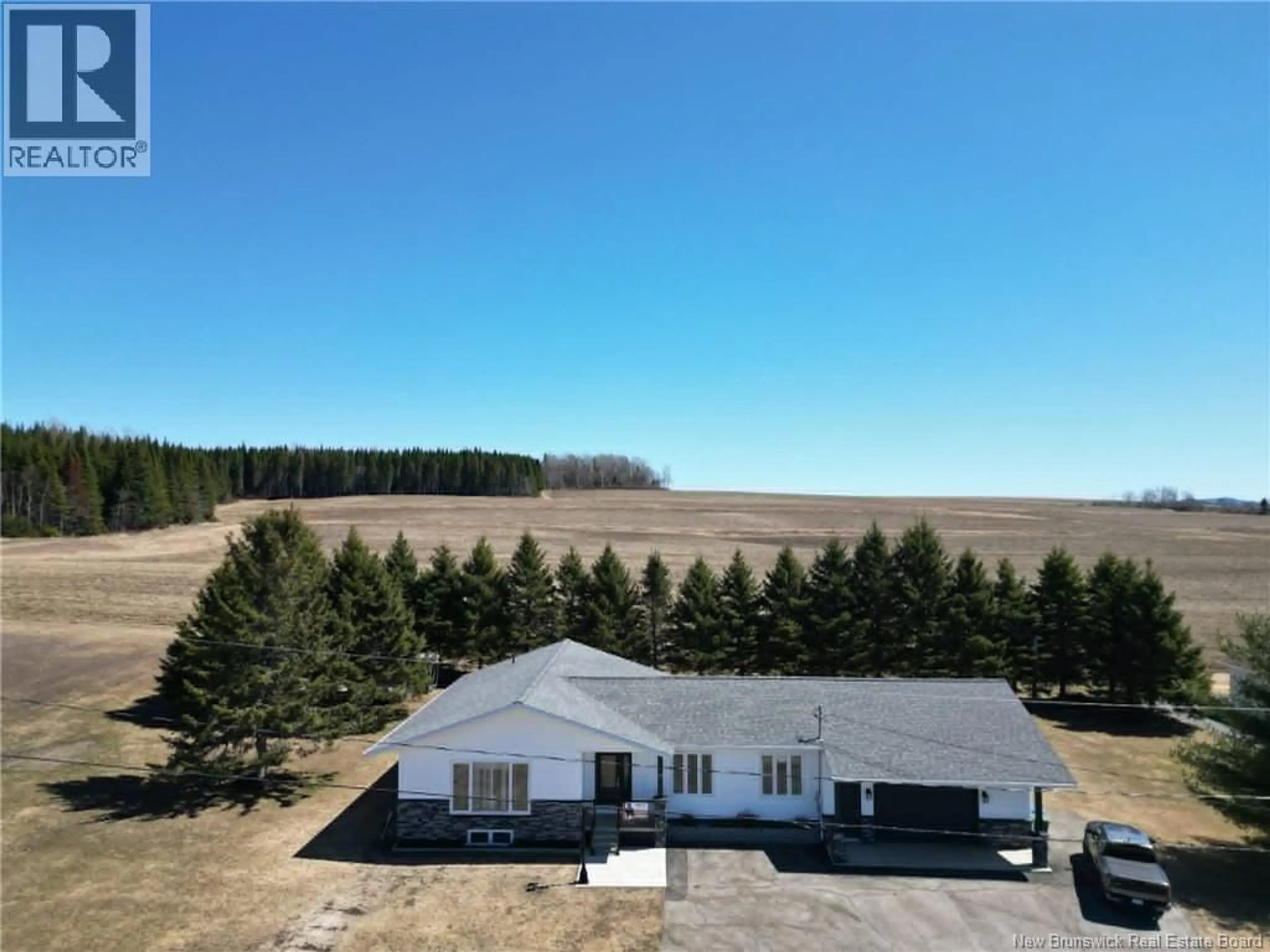 A pic from outside/outdoor area/front of a property/back of a property/a pic from drone, building for 19 5TH AVE, Saint-André New Brunswick E3Y3M2