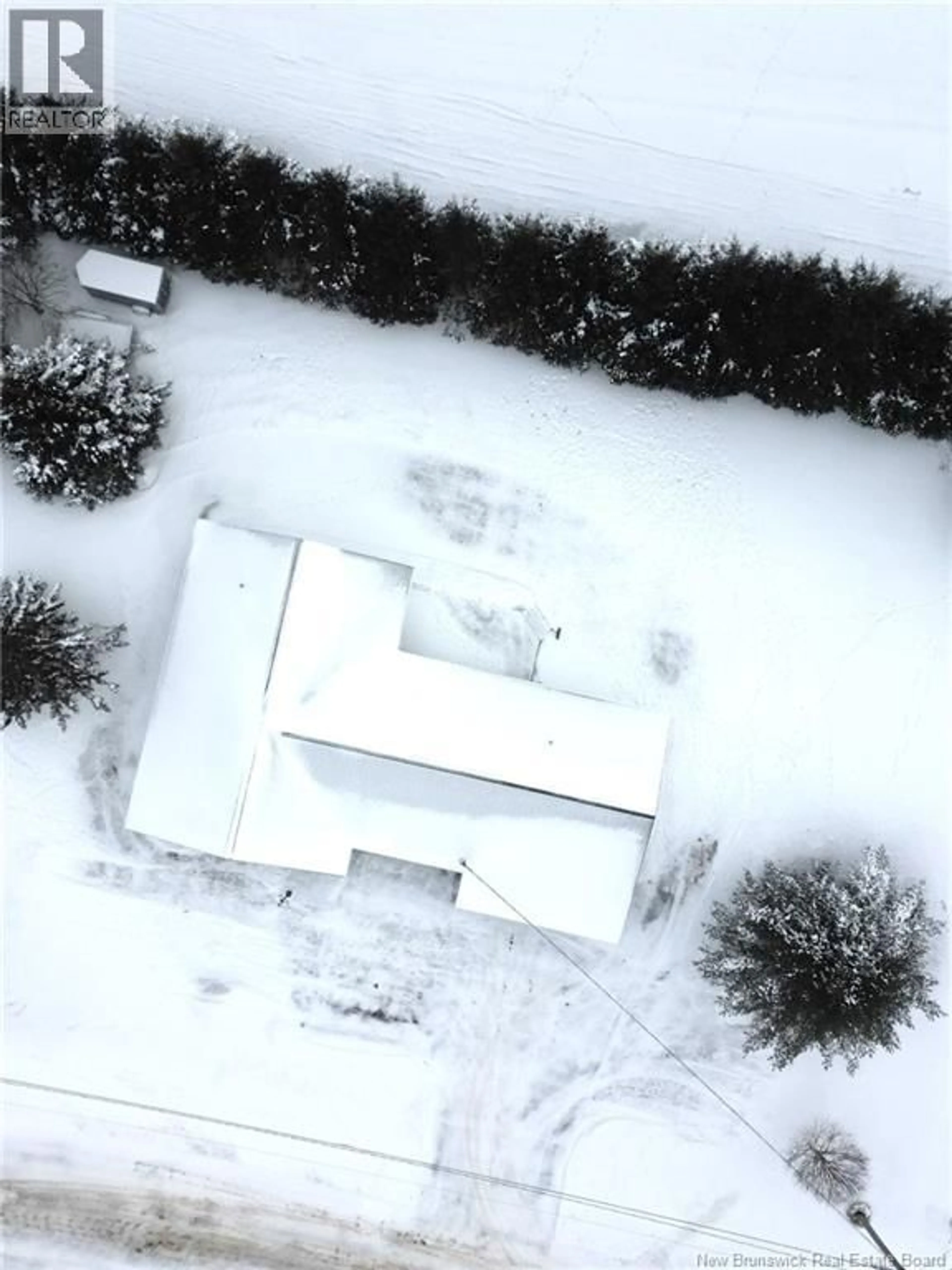 A pic from outside/outdoor area/front of a property/back of a property/a pic from drone, building for 19 5TH AVE, Saint-André New Brunswick E3Y3M2