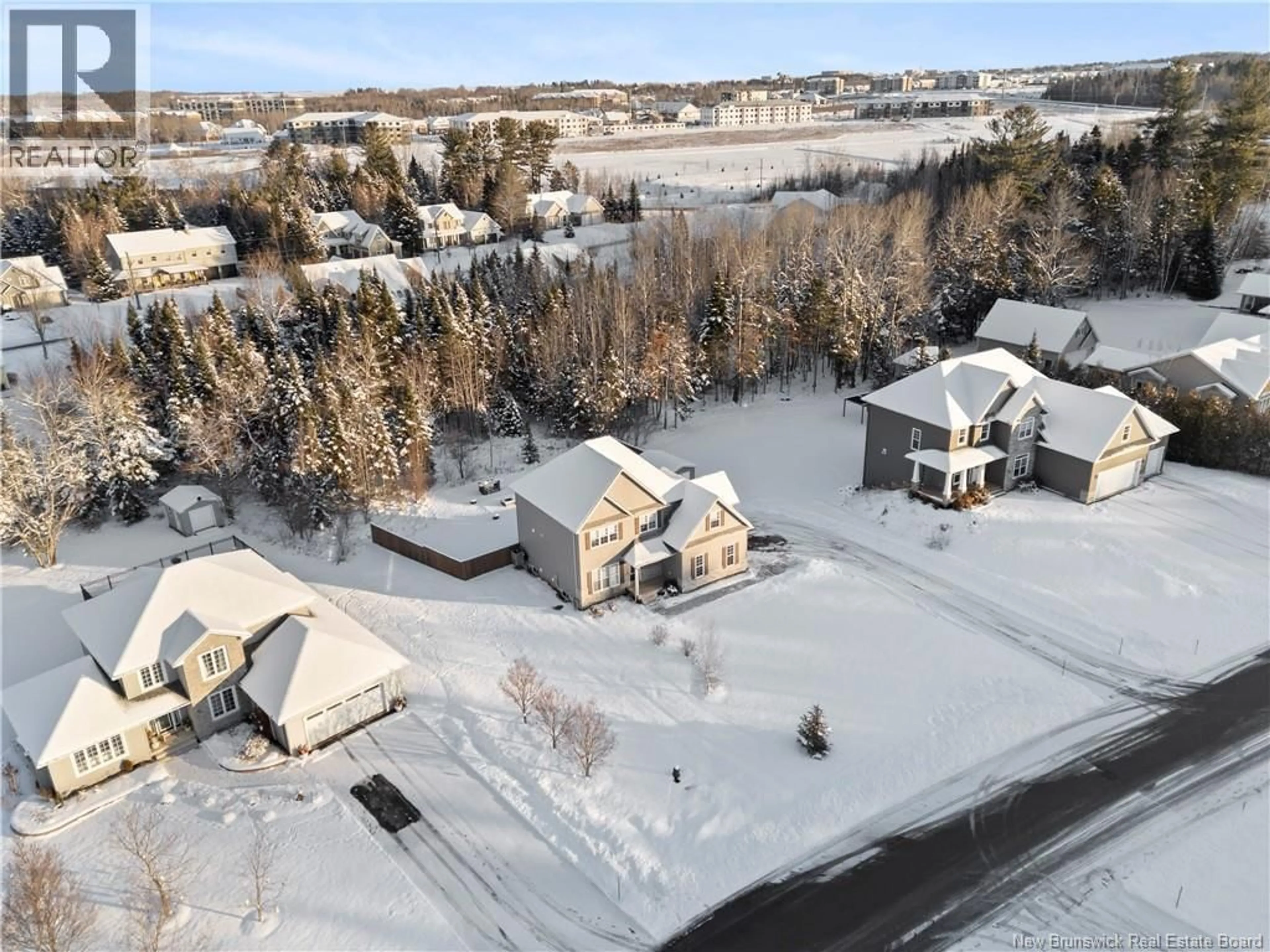 A pic from outside/outdoor area/front of a property/back of a property/a pic from drone, unknown for 51 MAURICE CRESCENT, Dieppe New Brunswick E1A8R1