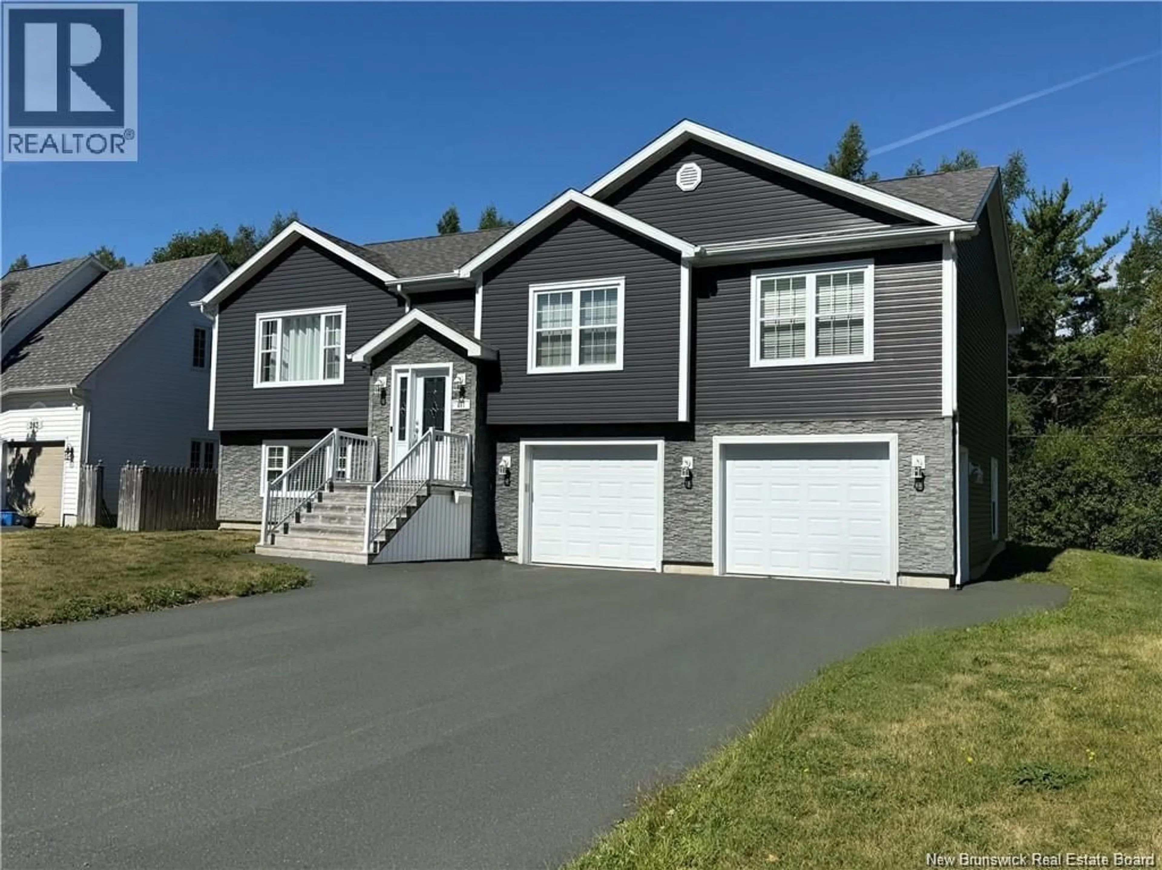 Home with vinyl exterior material, street for 207 CLAIRE AVENUE, Miramichi New Brunswick E1V3Z6