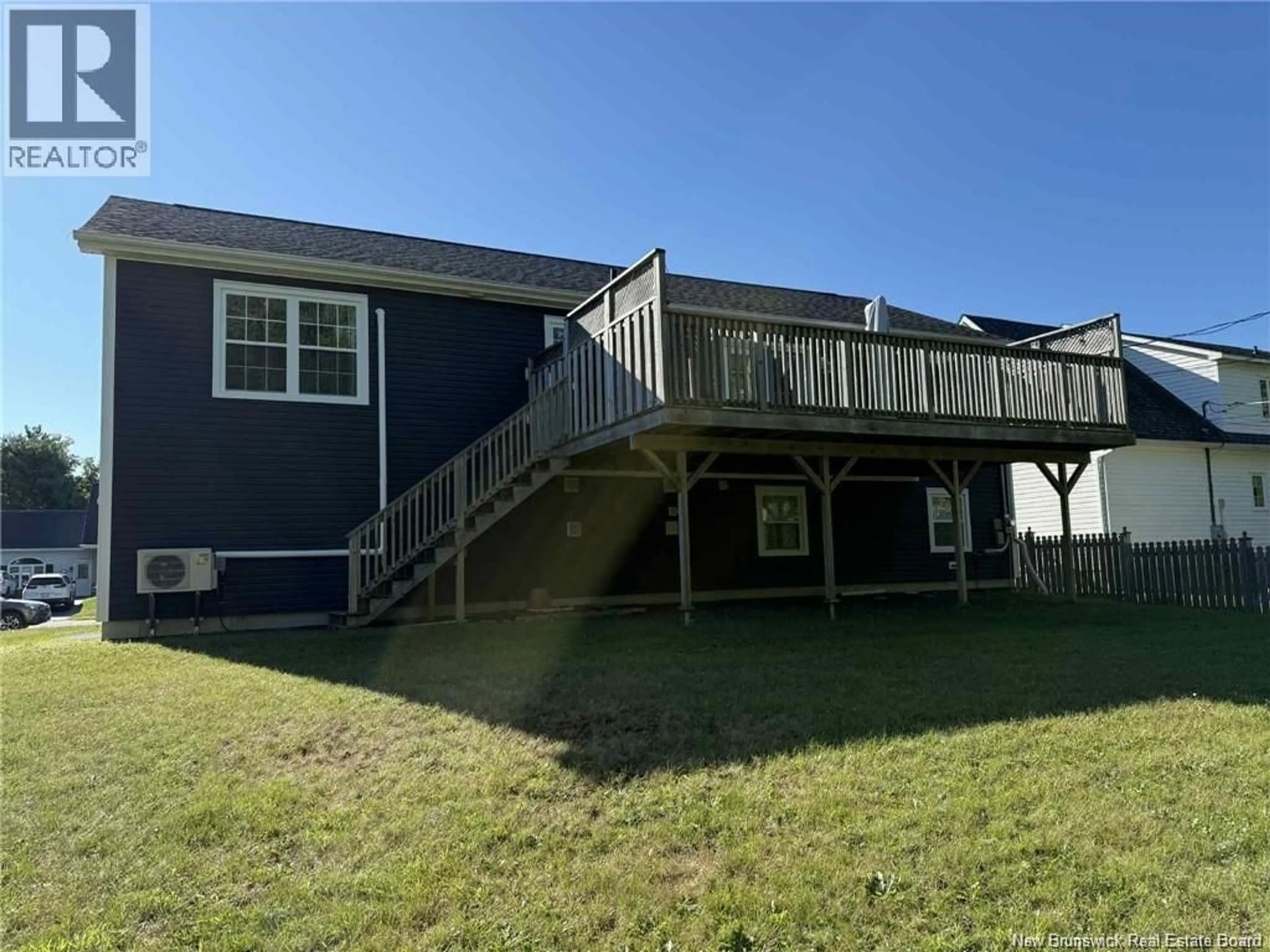 A pic from outside/outdoor area/front of a property/back of a property/a pic from drone, unknown for 207 CLAIRE AVENUE, Miramichi New Brunswick E1V3Z6