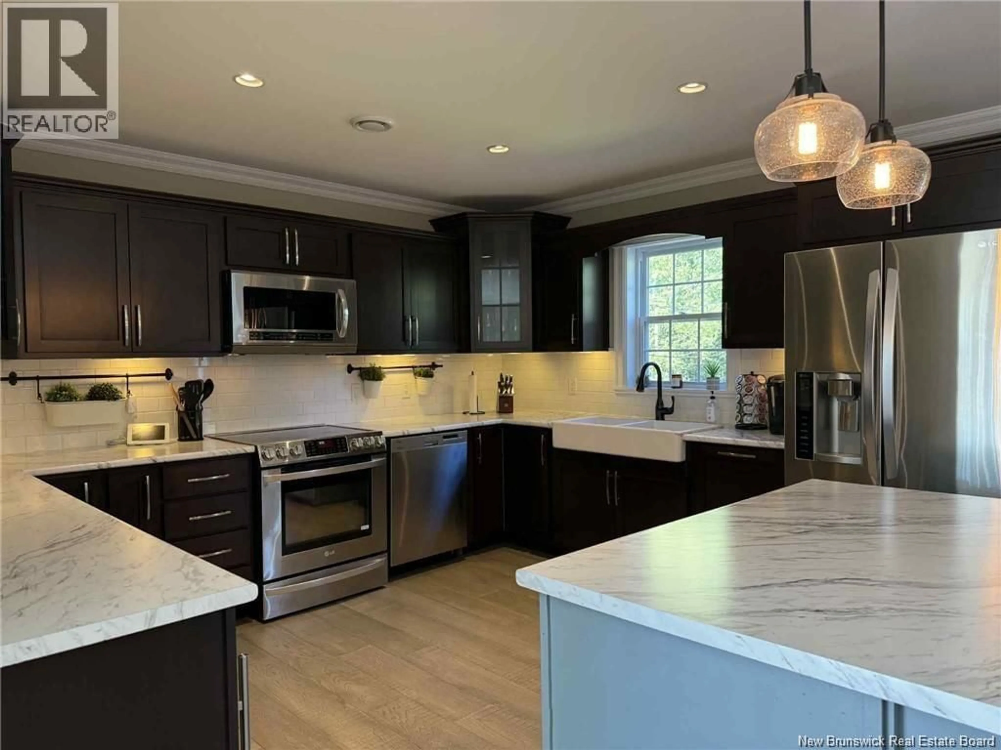 Open concept kitchen, ceramic/tile floor for 207 CLAIRE AVENUE, Miramichi New Brunswick E1V3Z6