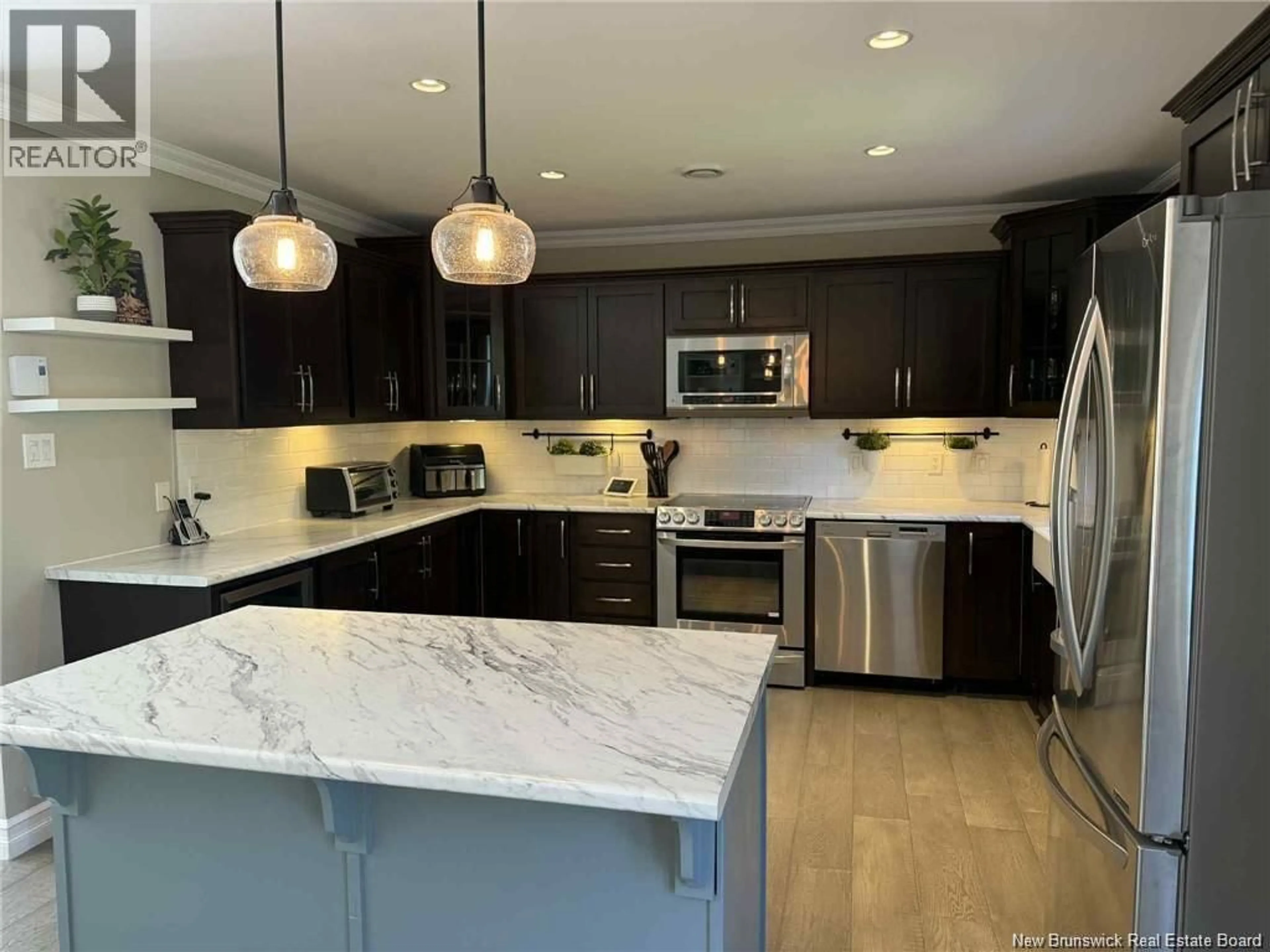 Open concept kitchen, ceramic/tile floor for 207 CLAIRE AVENUE, Miramichi New Brunswick E1V3Z6