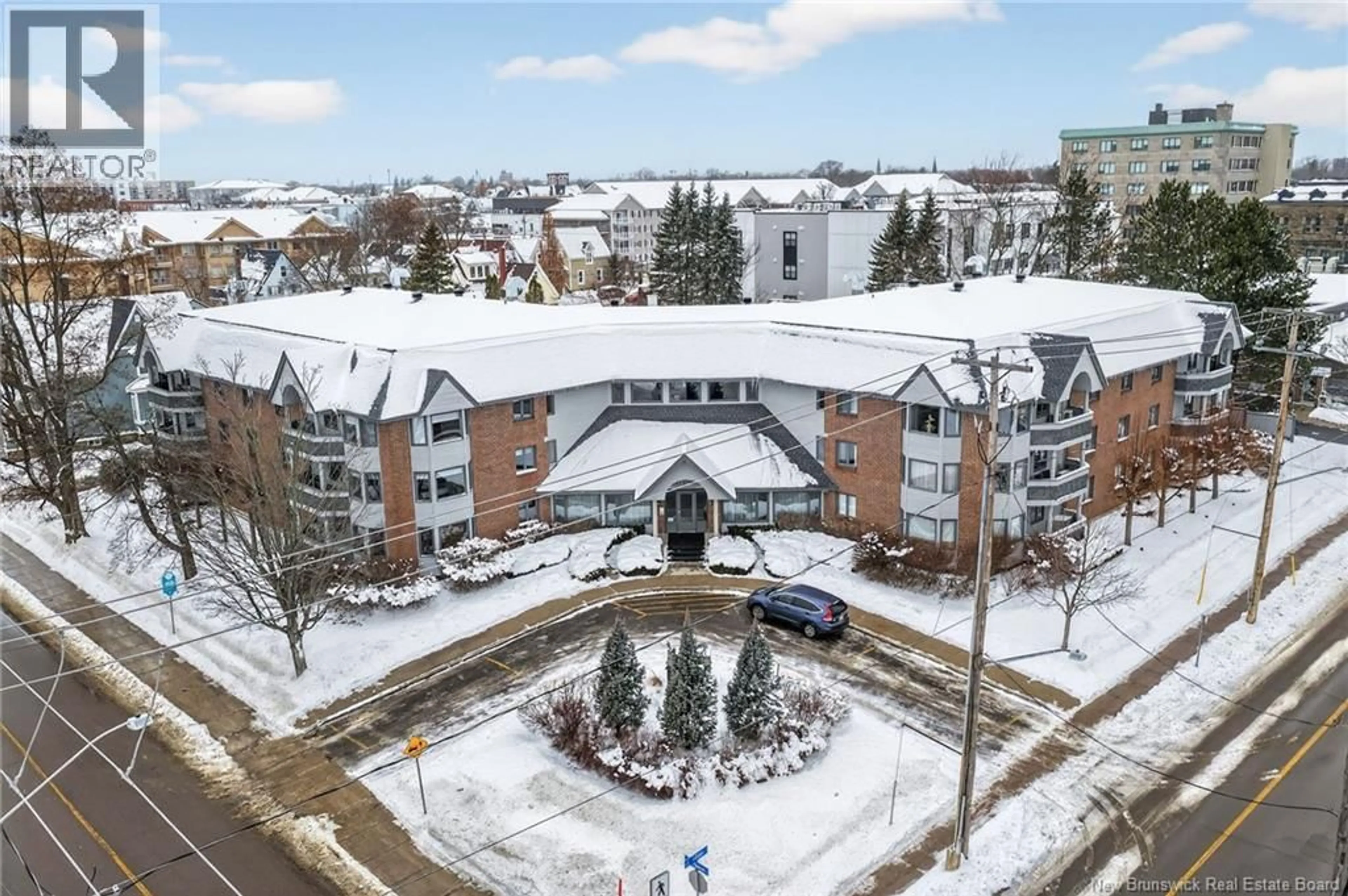 A pic from outside/outdoor area/front of a property/back of a property/a pic from drone, mountain view for 206 - 191 QUEEN STREET, Moncton New Brunswick E1C1L3