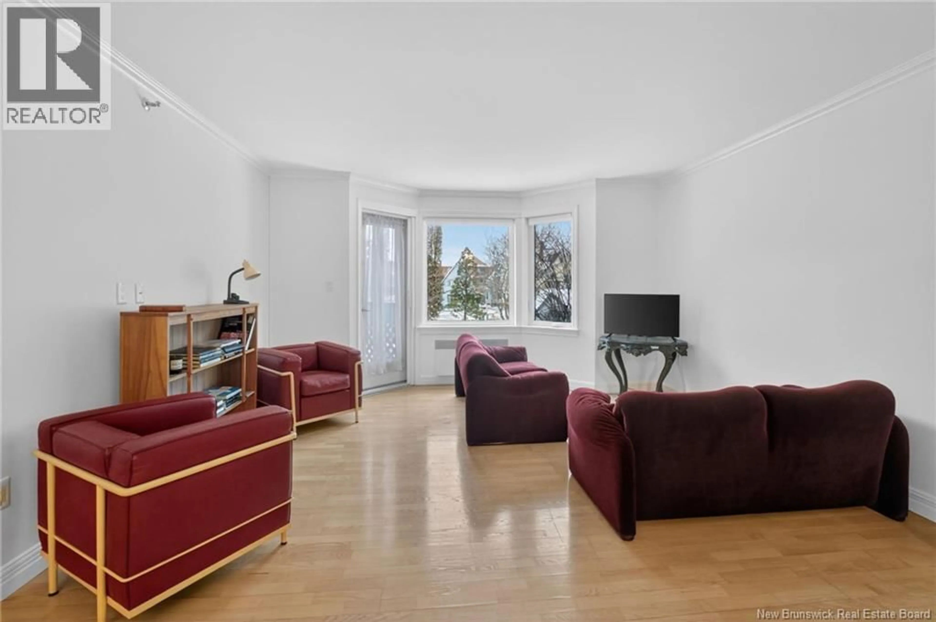 Living room with furniture, unknown for 206 - 191 QUEEN STREET, Moncton New Brunswick E1C1L3