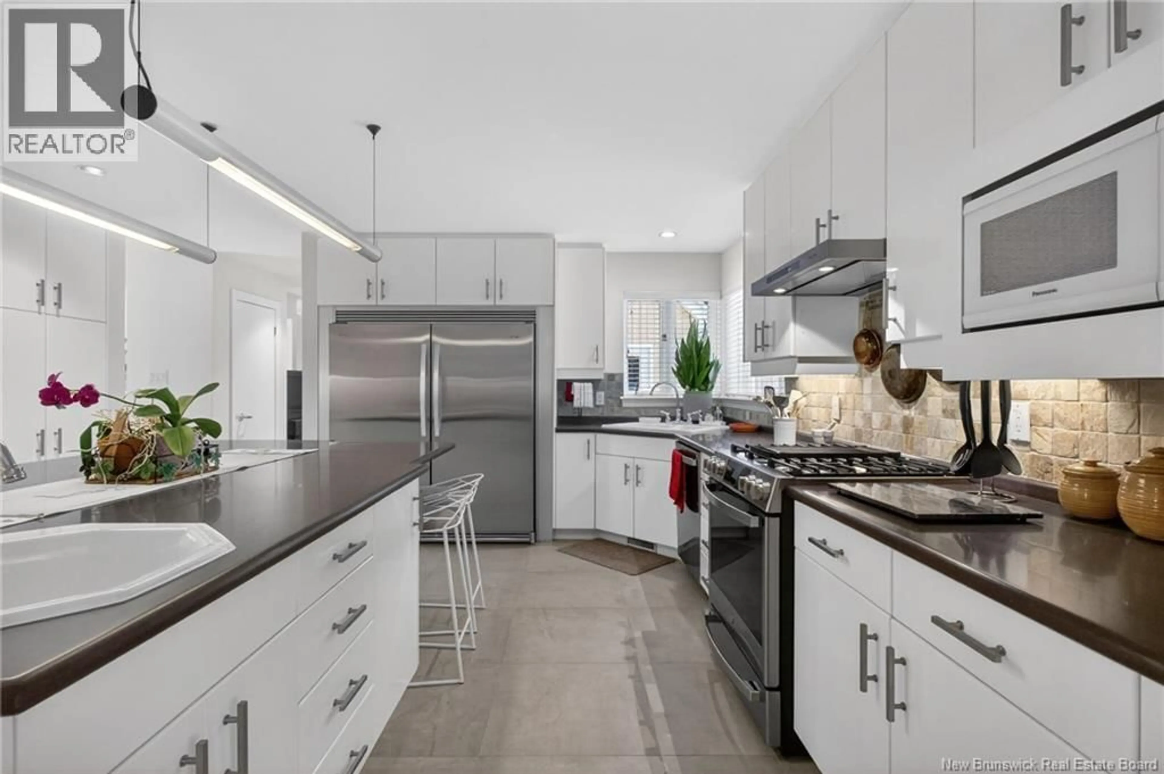 Open concept kitchen, ceramic/tile floor for 353 LAVOIE STREET, Dieppe New Brunswick E1A6R8