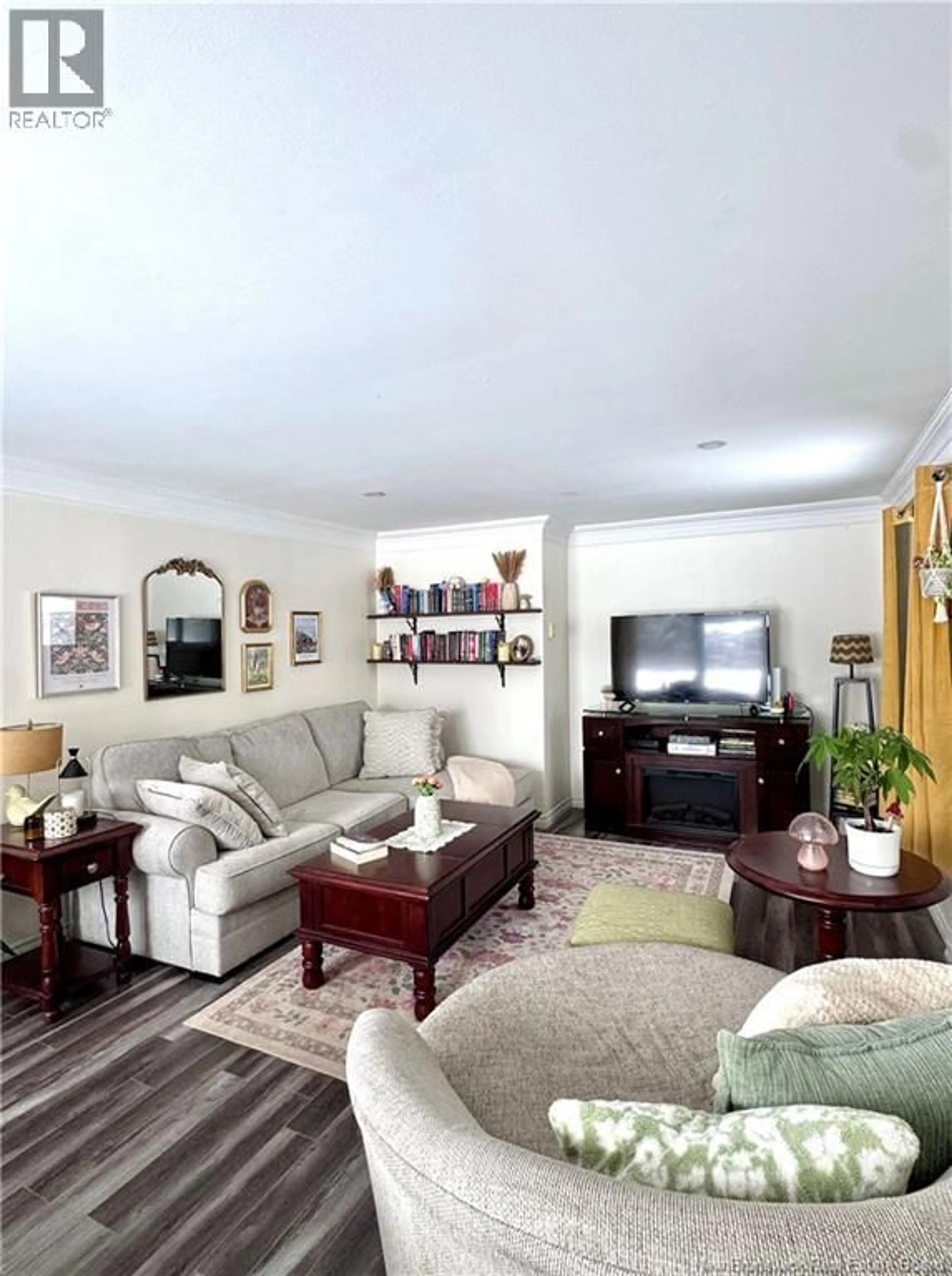 Living room with furniture, wood/laminate floor for 156 GORDON ROAD, Miramichi New Brunswick E1N1Z4