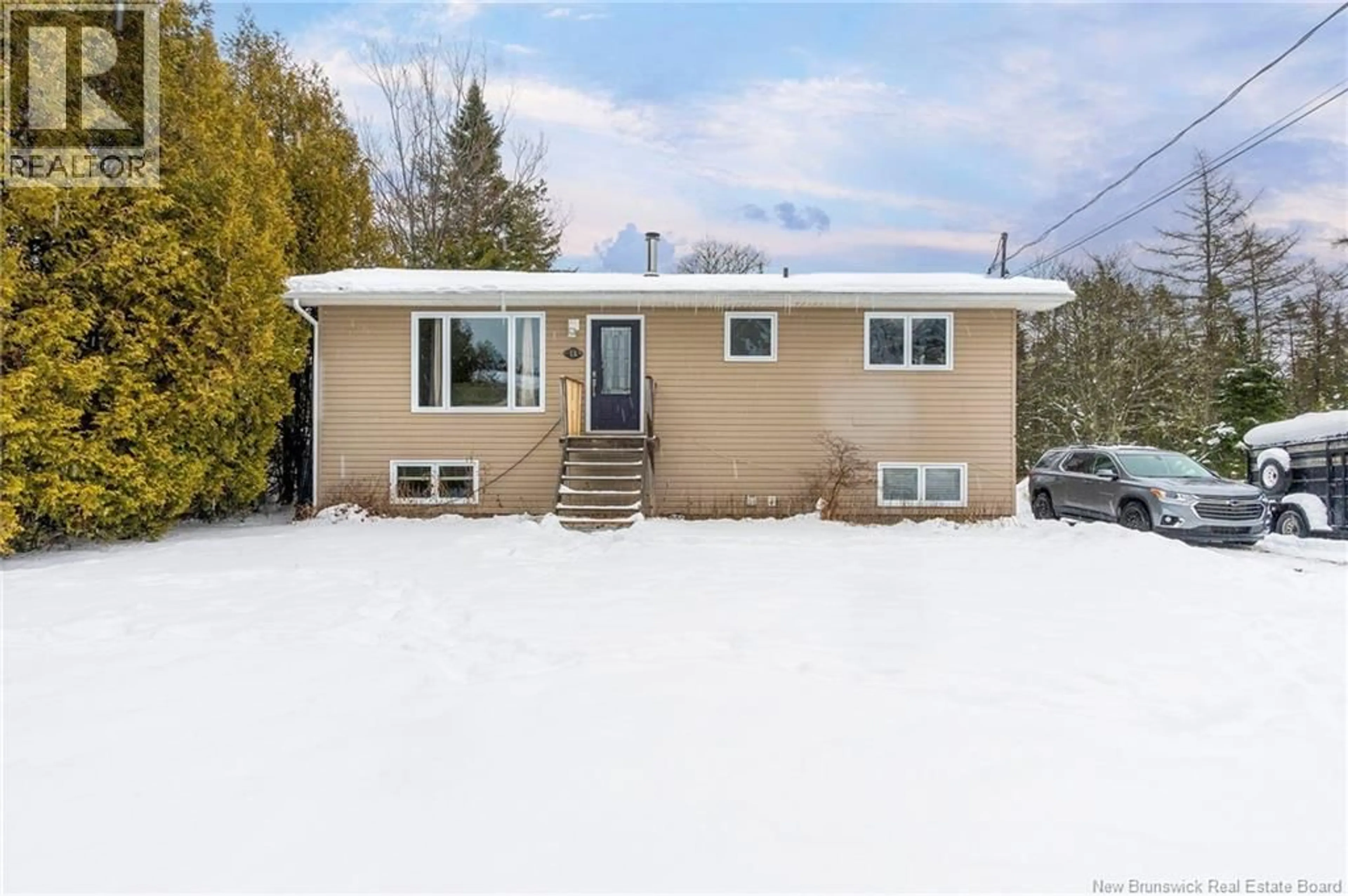 Home with vinyl exterior material, street for 15 MILLS AVENUE, Garnett Settlement New Brunswick E2S1X1