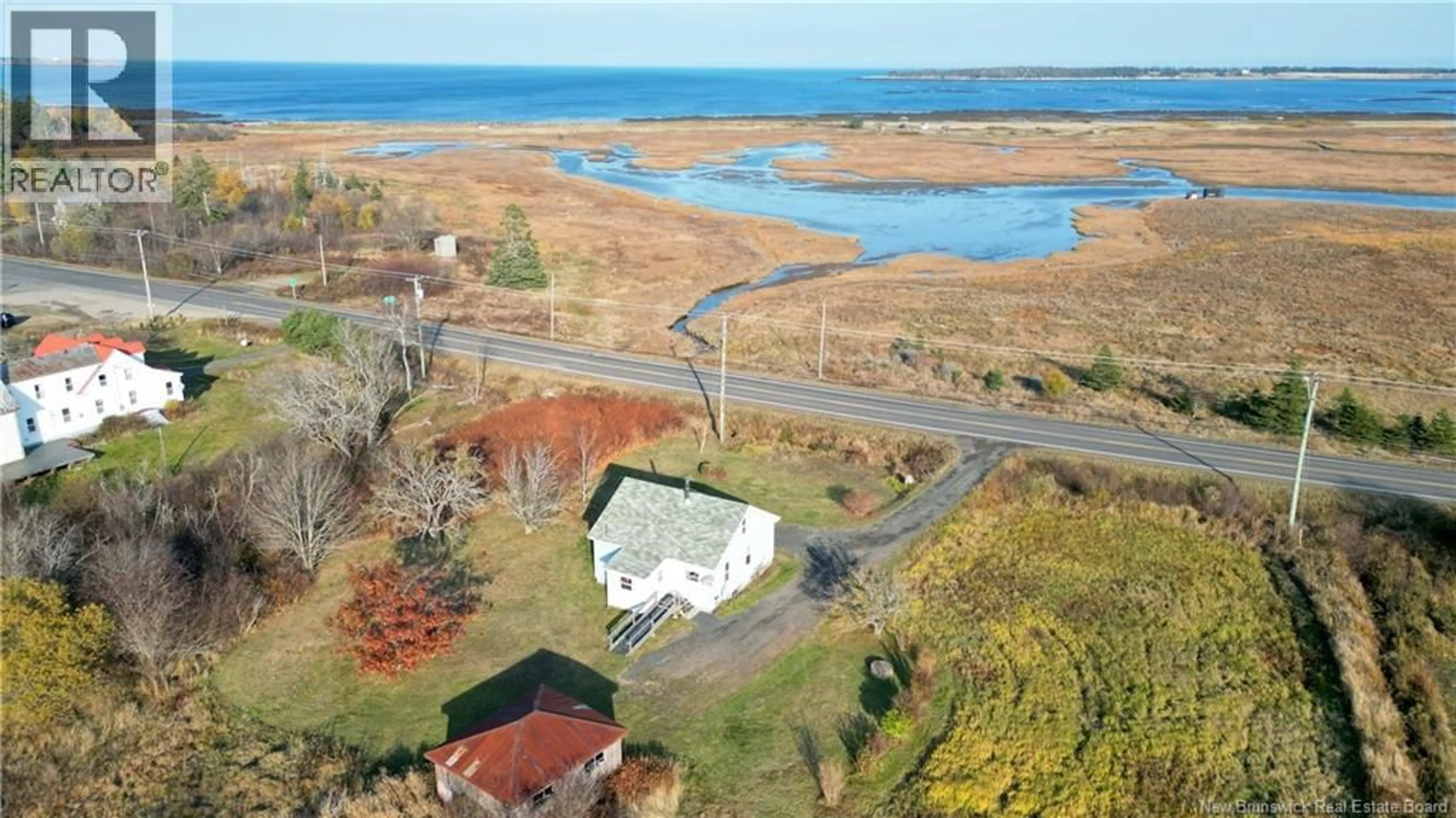 A pic from outside/outdoor area/front of a property/back of a property/a pic from drone, water/lake/river/ocean view for 610 ROUTE 776, Grand Manan New Brunswick E5G3C1
