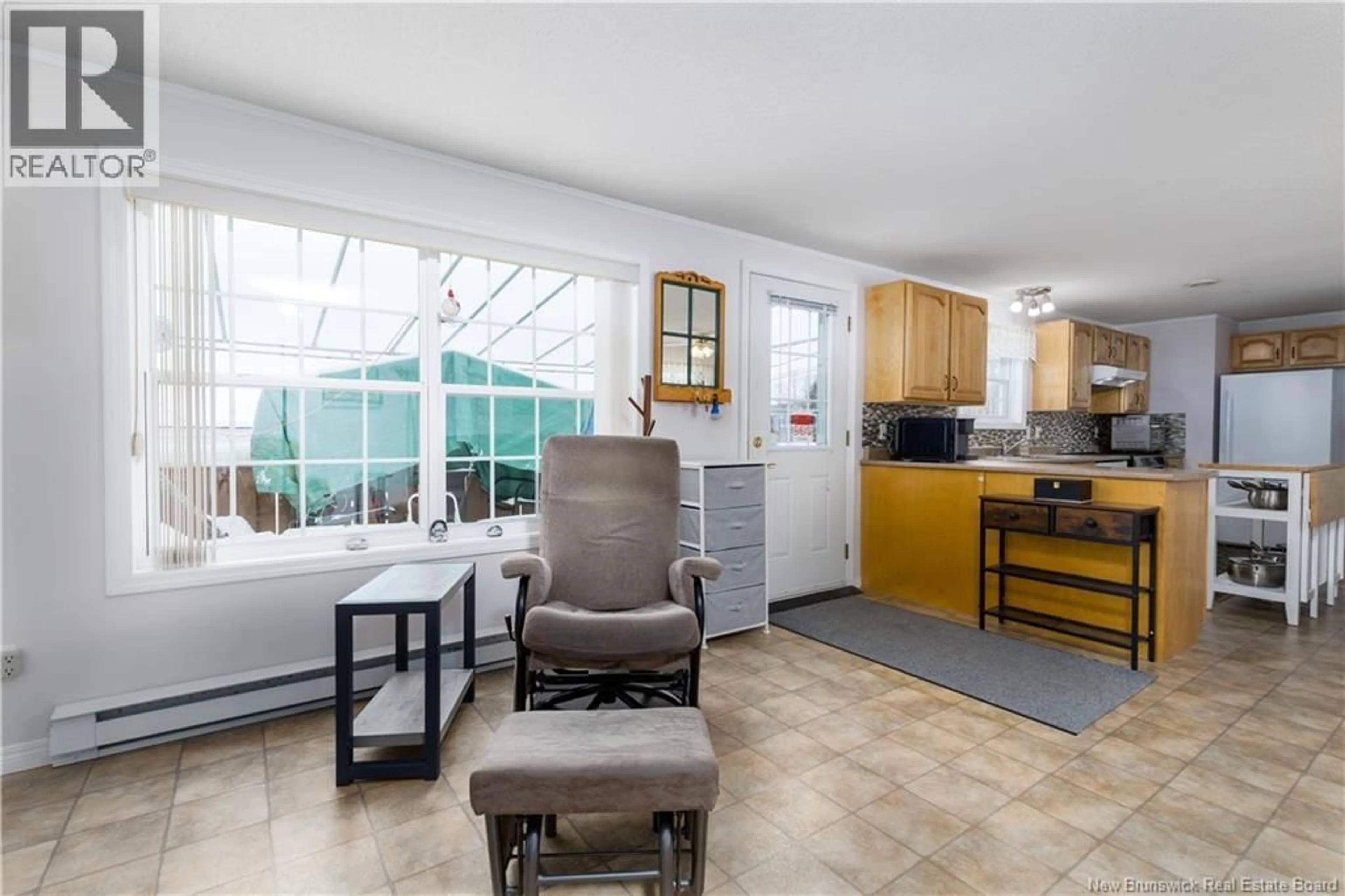 Open concept kitchen, ceramic/tile floor for 12 KATE STREET, Grand-Sault/Grand Falls New Brunswick E3Z0A5