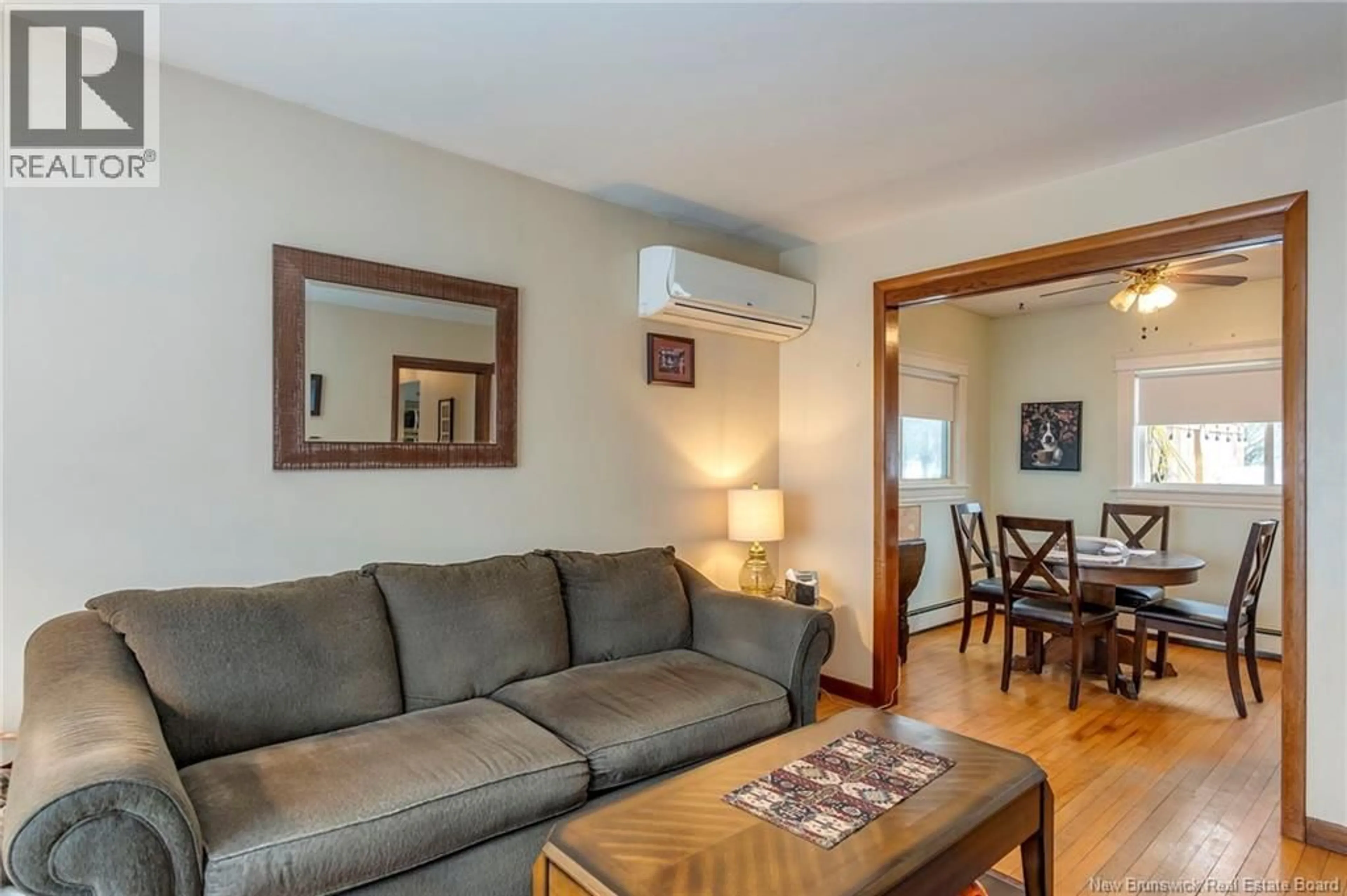 Living room with furniture, wood/laminate floor for 12 KELTON STREET, Saint John New Brunswick E2J3A7