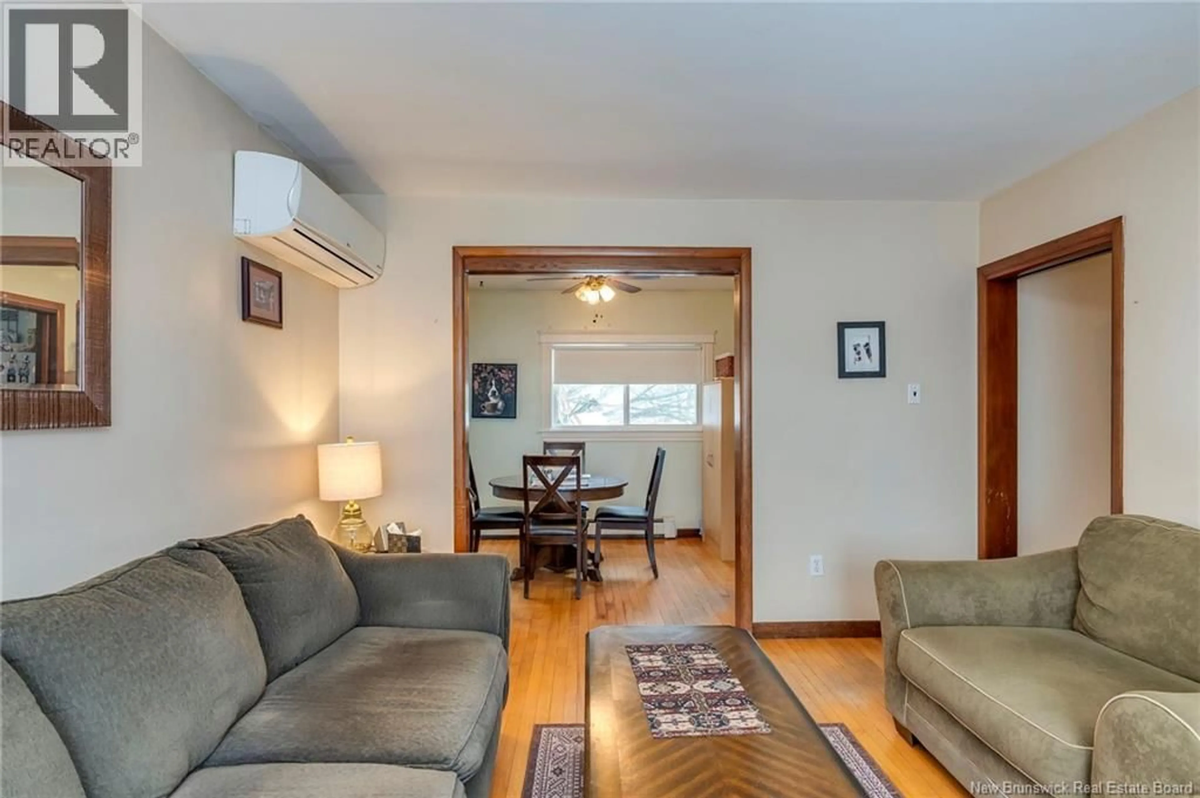 Living room with furniture, wood/laminate floor for 12 KELTON STREET, Saint John New Brunswick E2J3A7