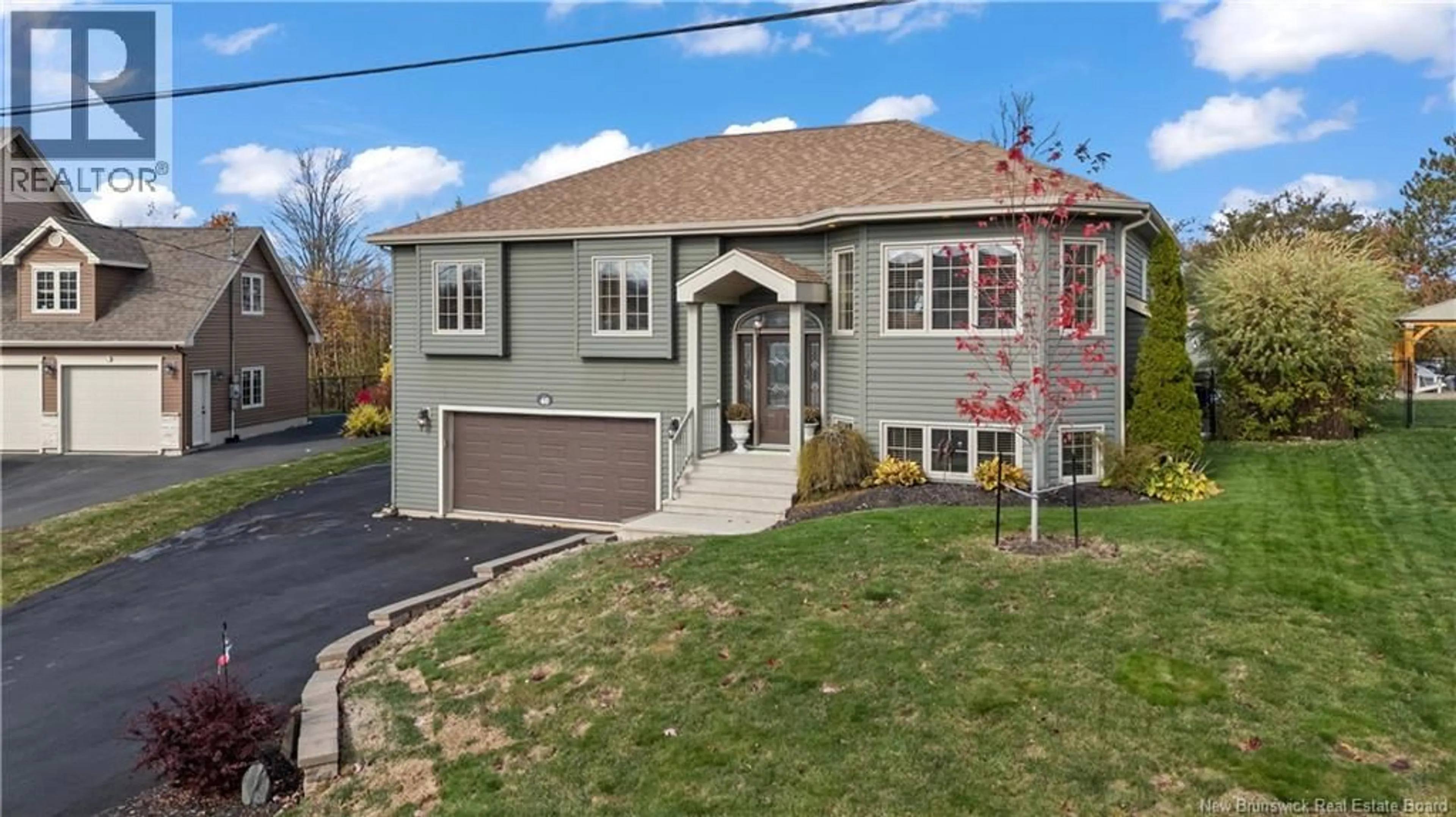 Home with vinyl exterior material, street for 40 EUGENE COURT, Dieppe New Brunswick E1A0P2