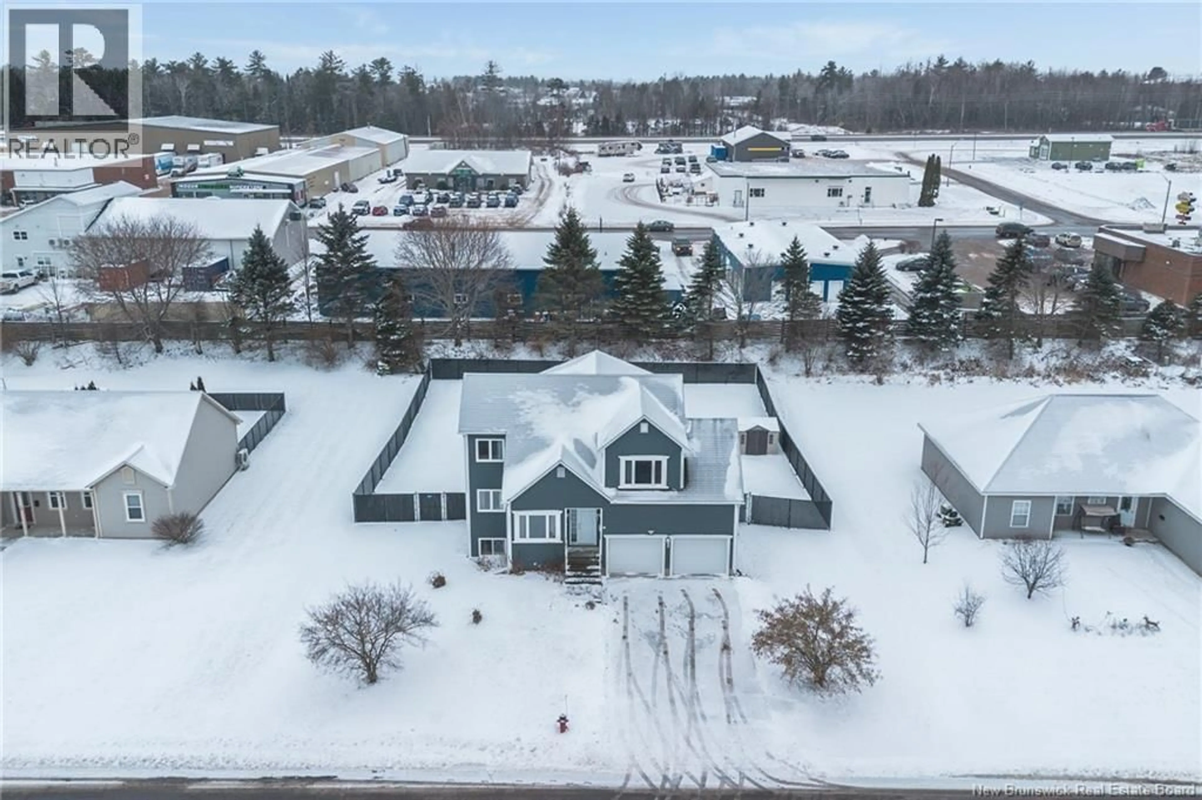 A pic from outside/outdoor area/front of a property/back of a property/a pic from drone, unknown for 16 HOWE CRESCENT, Oromocto New Brunswick E2V4M5