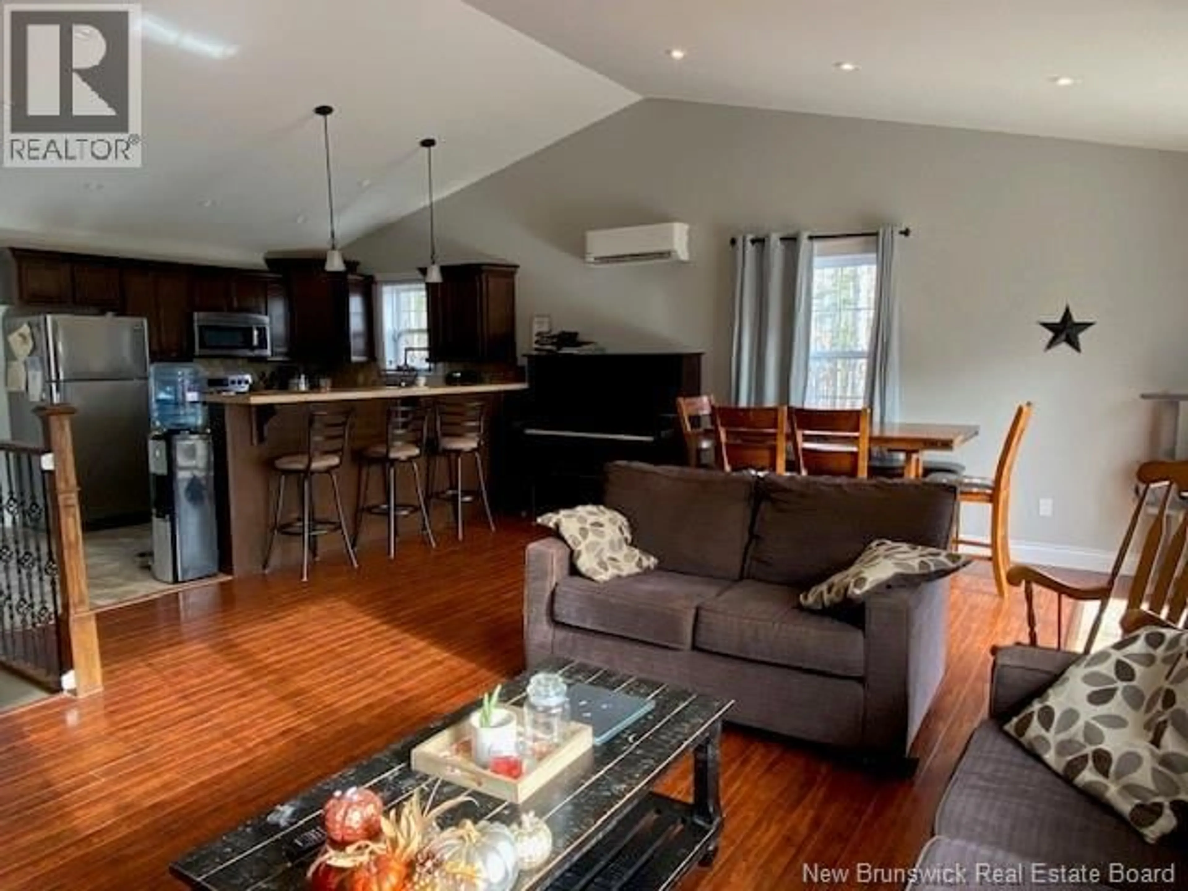 Open concept kitchen, wood/laminate floor for 107 MAXTAN DRIVE, Penobsquis New Brunswick E4G2B2