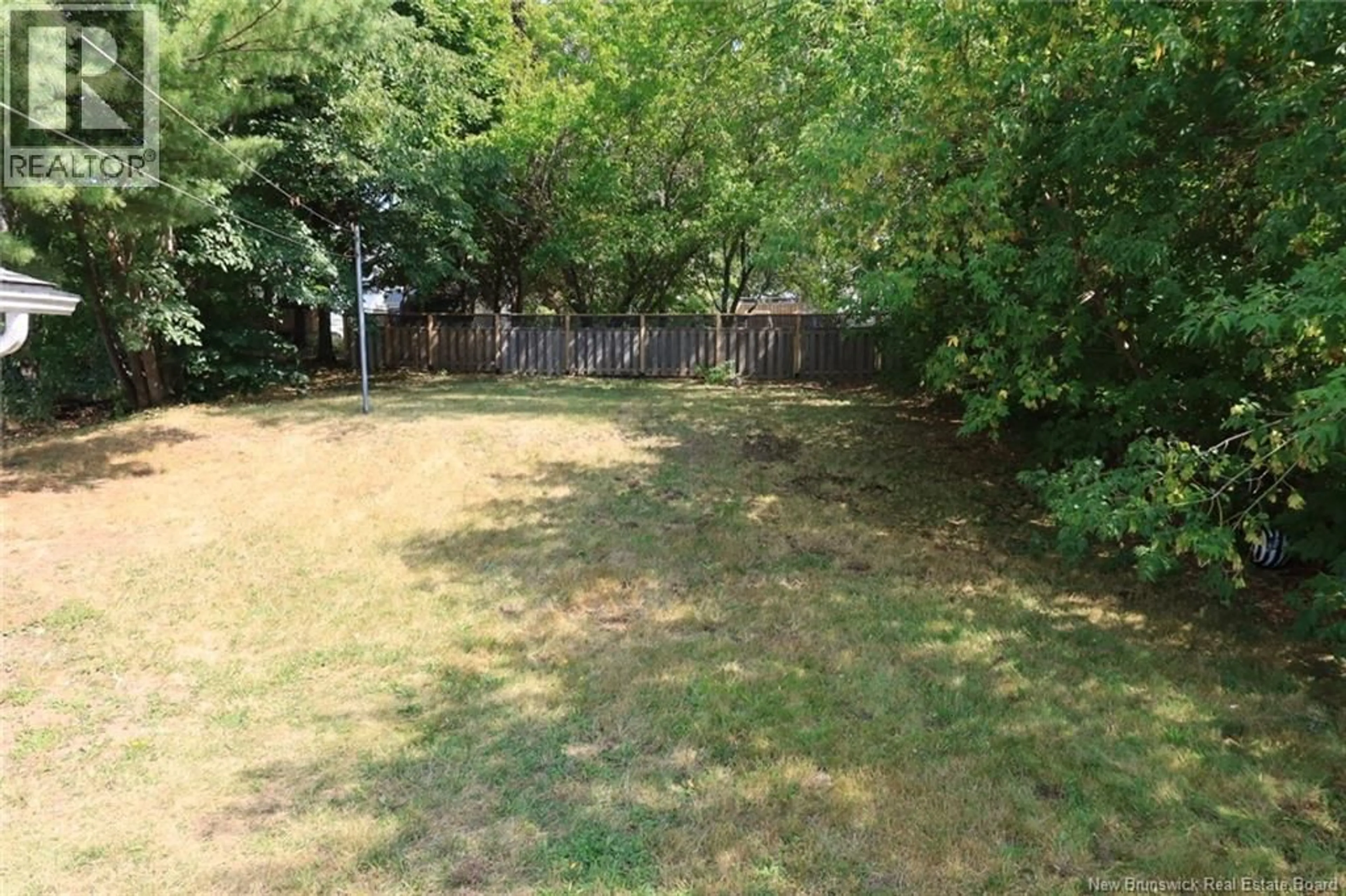 A pic from outside/outdoor area/front of a property/back of a property/a pic from drone, forest/trees view for 89 BROADWAY STREET, Moncton New Brunswick E1A3Y1