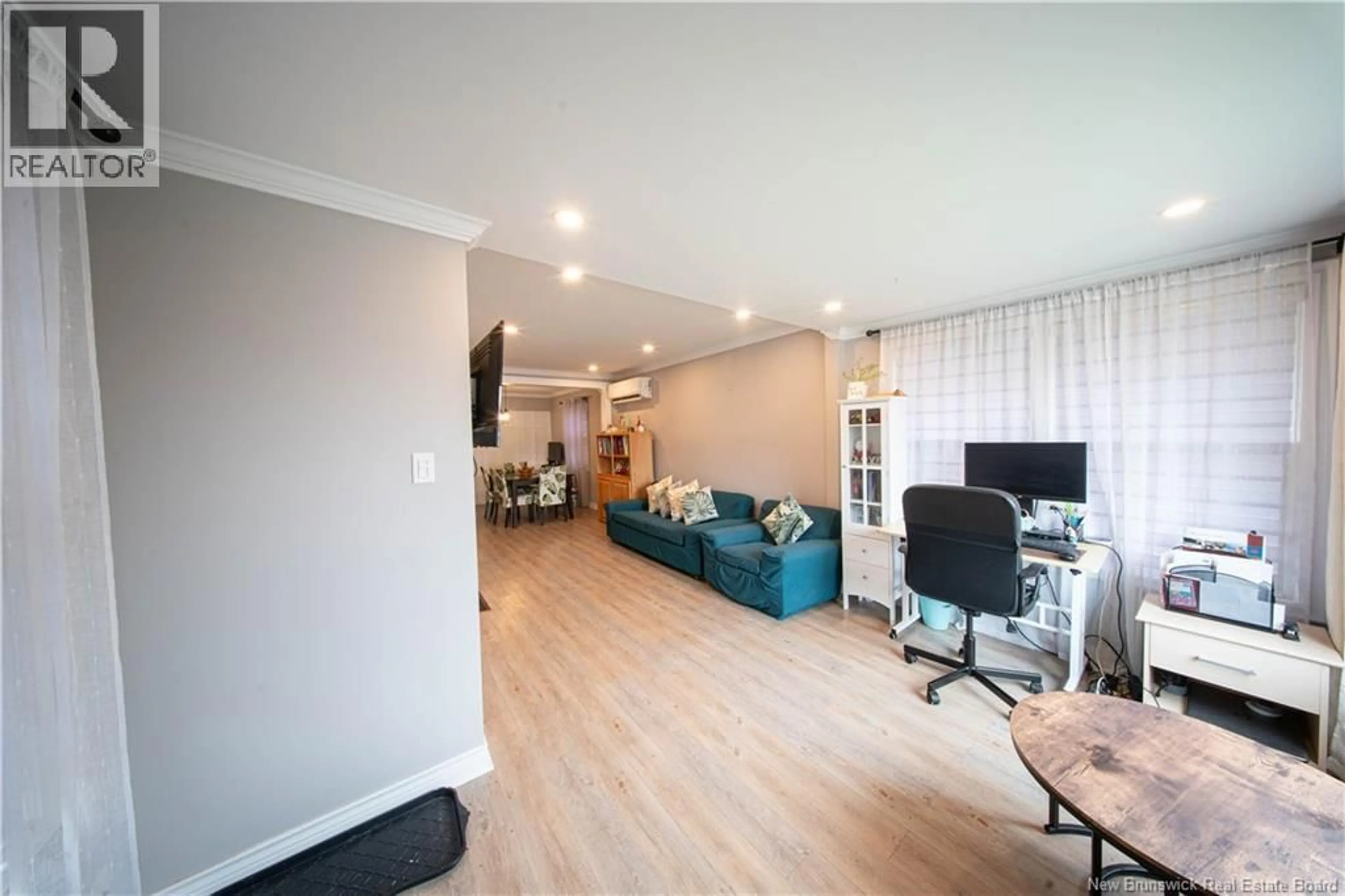 Living room with furniture, wood/laminate floor for 89 BROADWAY STREET, Moncton New Brunswick E1A3Y1