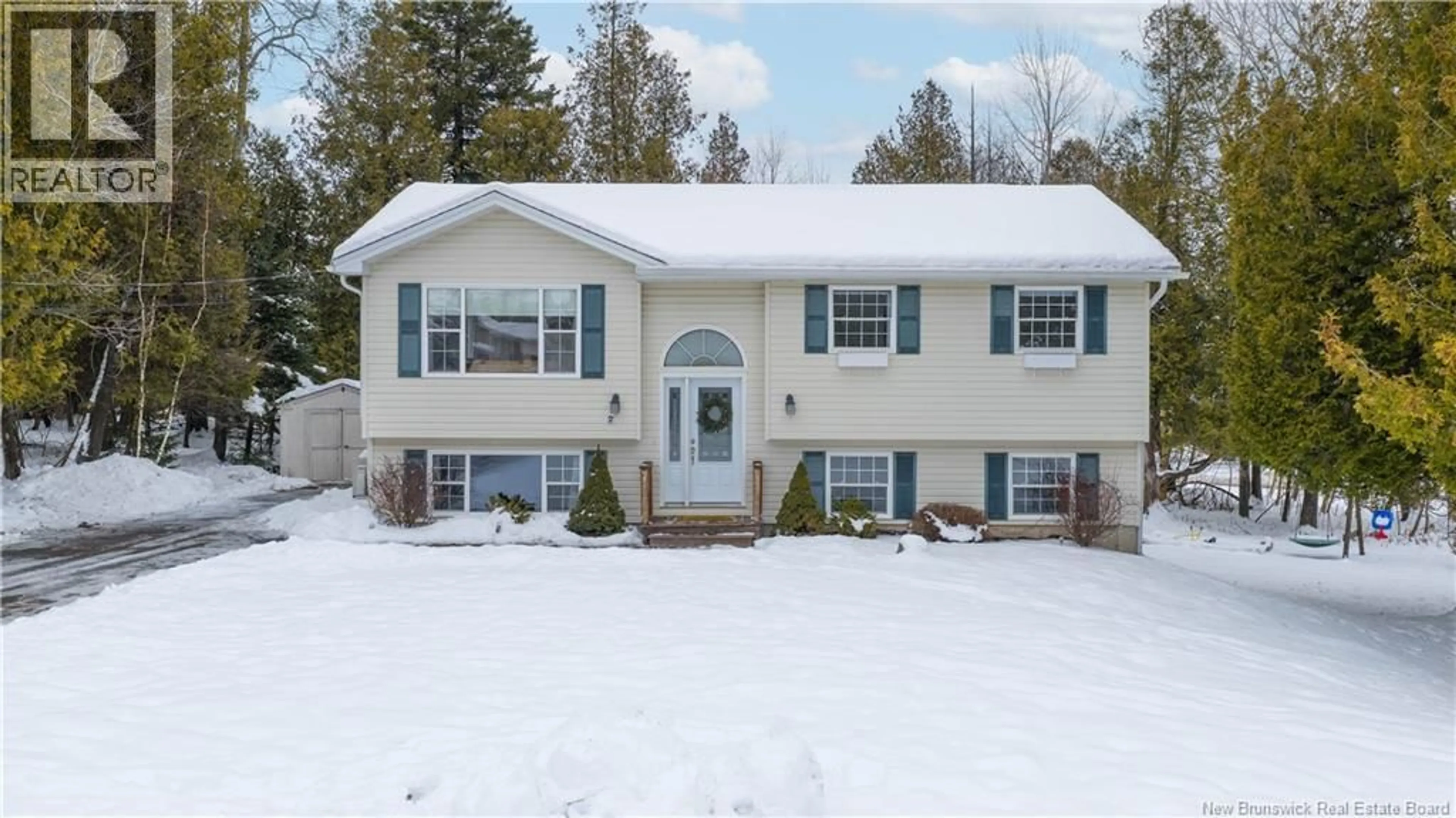 Home with vinyl exterior material, street for TAGISH, Quispamsis New Brunswick E2E6C2