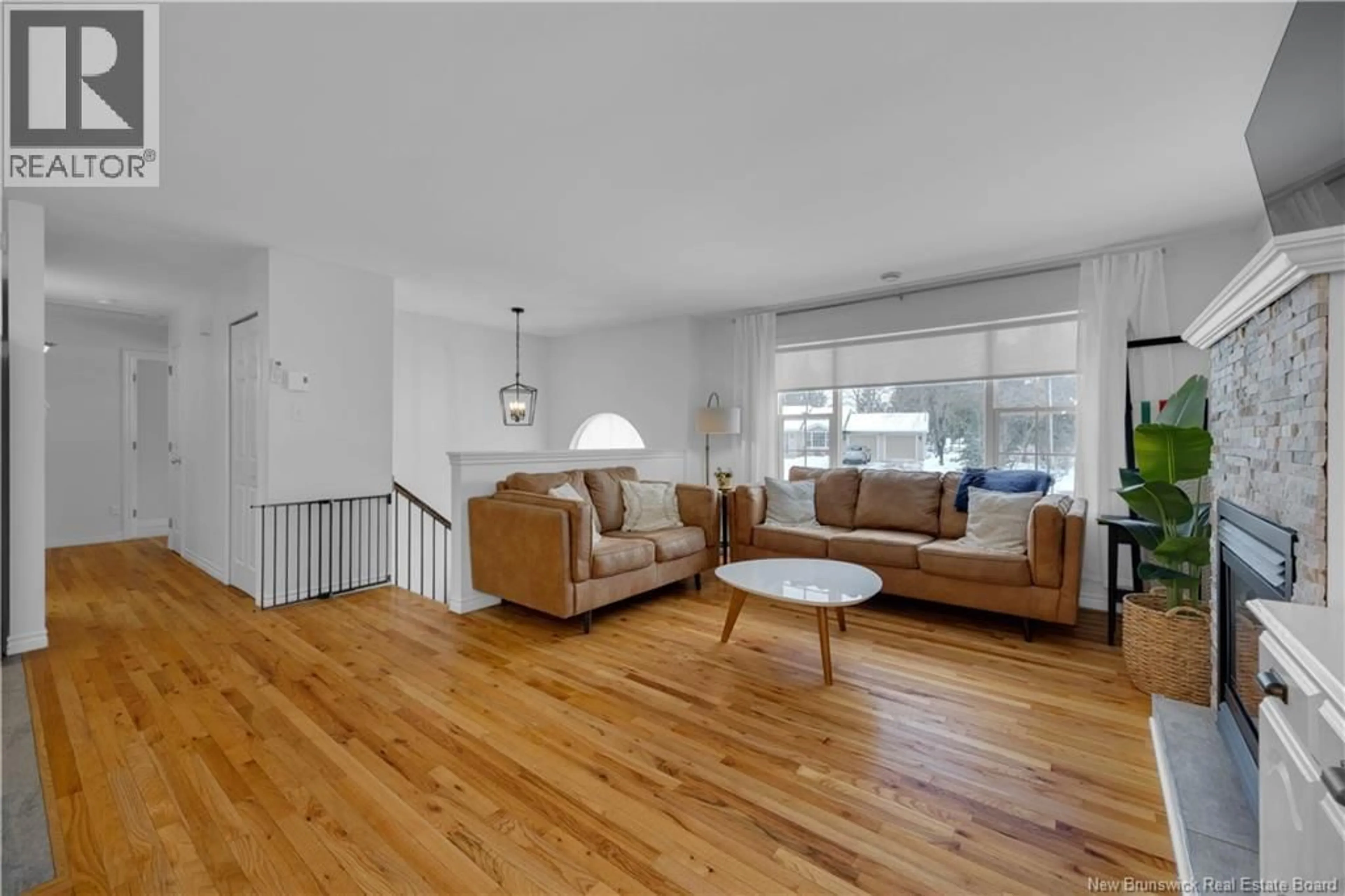Living room with furniture, wood/laminate floor for TAGISH, Quispamsis New Brunswick E2E6C2