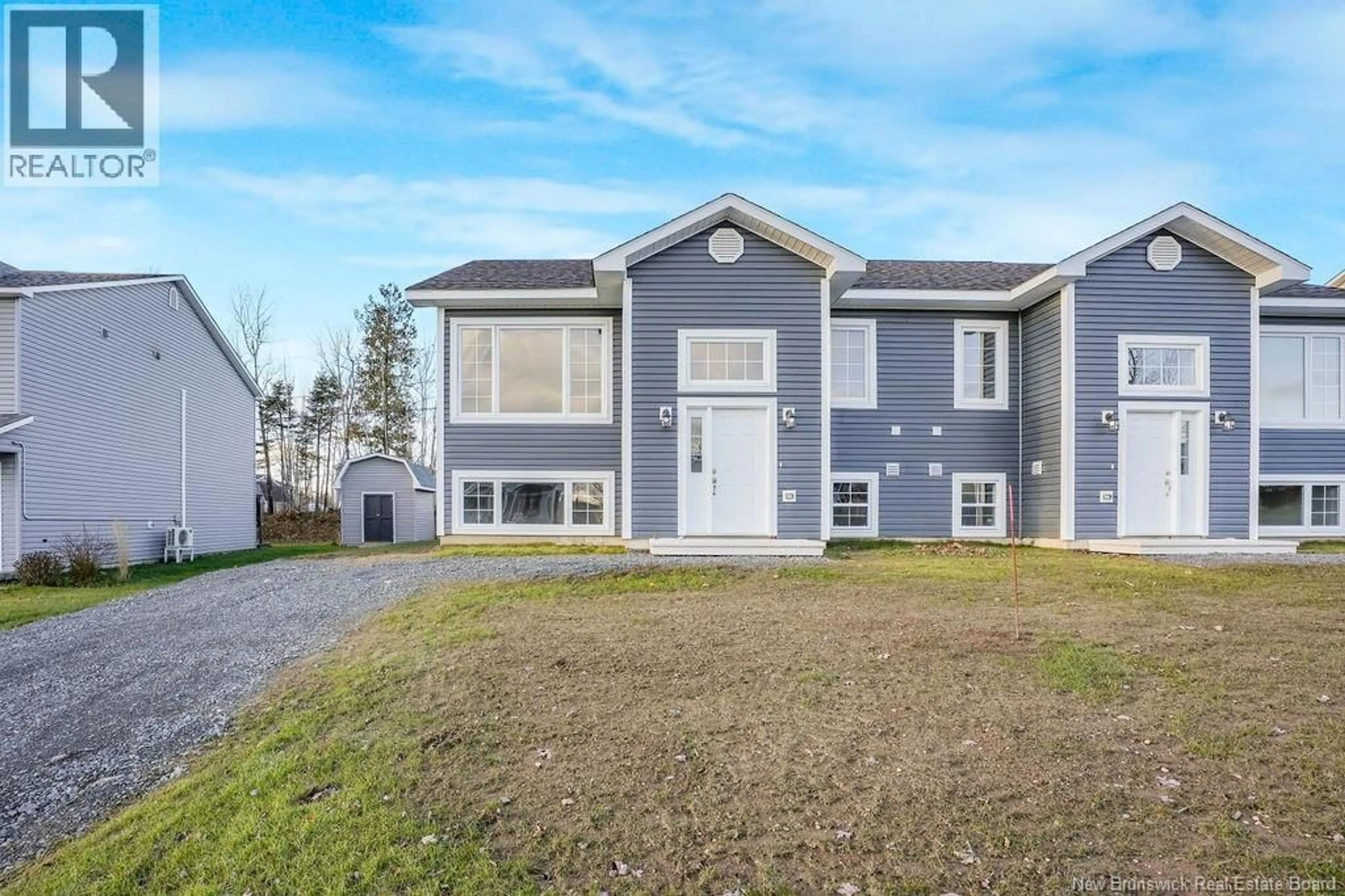 Home with vinyl exterior material, street for 65 YOUSSEF STREET, Fredericton New Brunswick E3G4K1