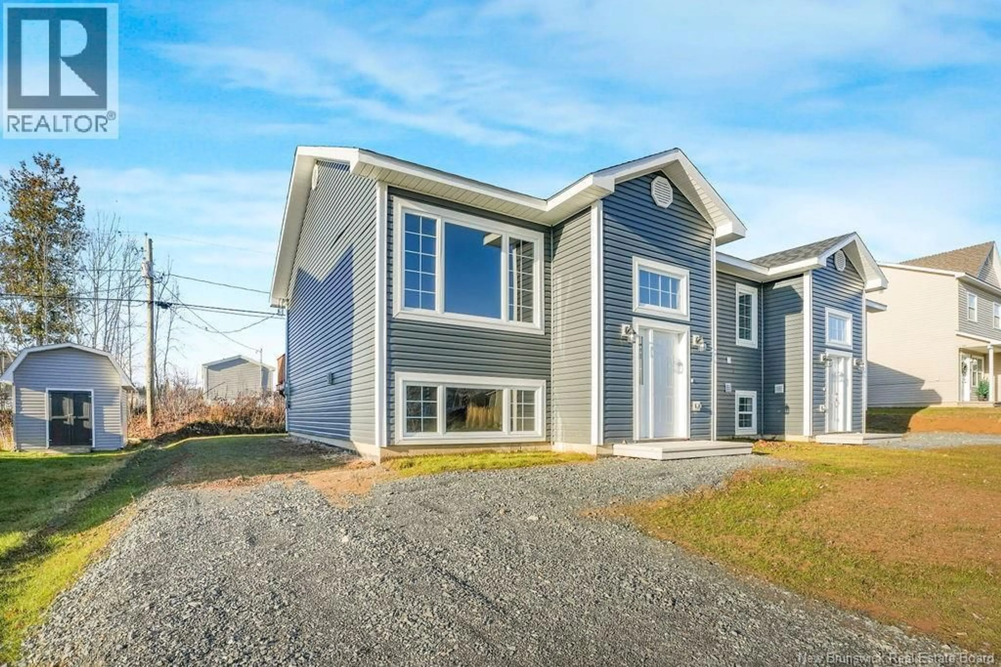 Home with vinyl exterior material, building for 65 YOUSSEF STREET, Fredericton New Brunswick E3G4K1