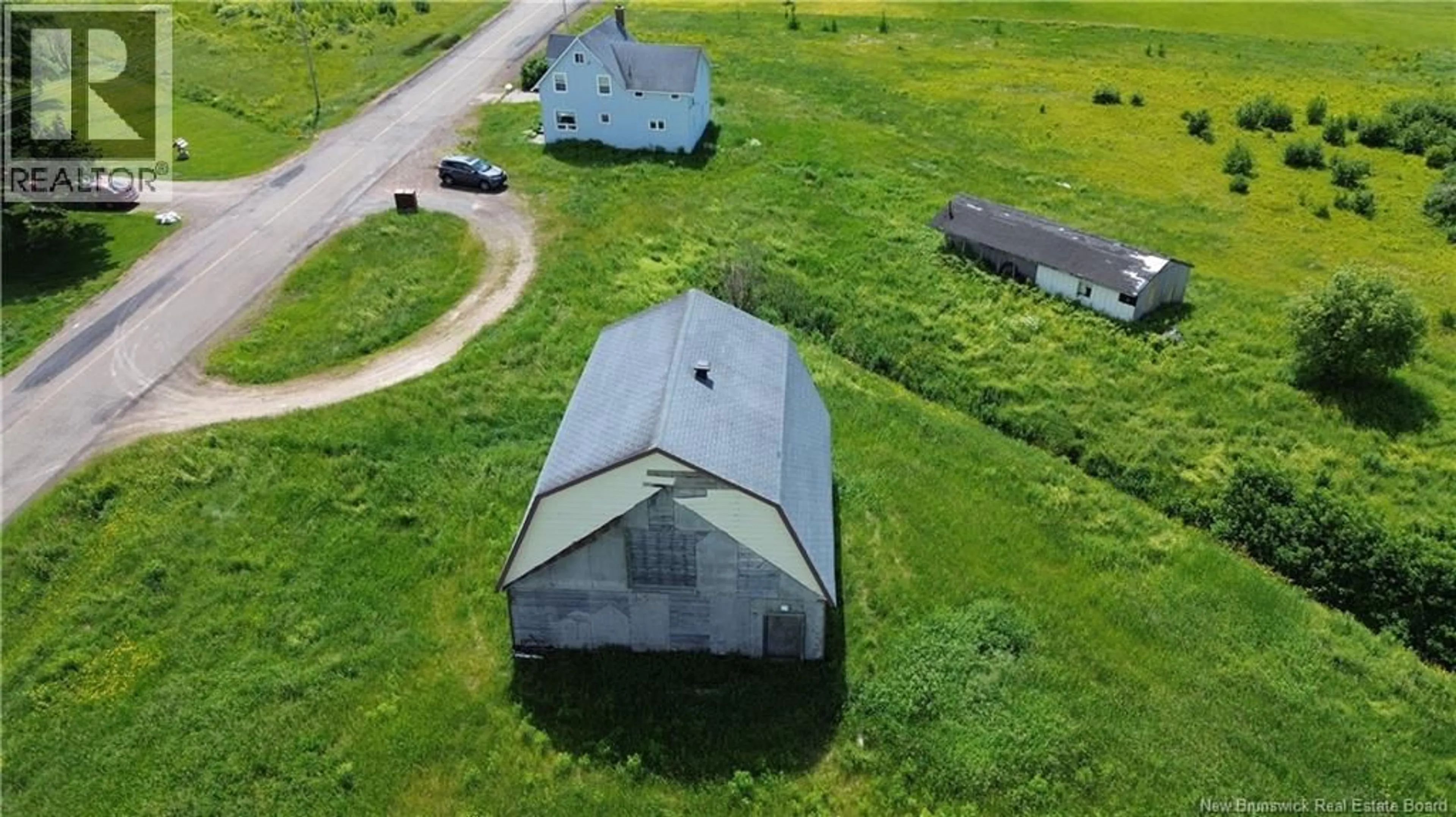A pic from outside/outdoor area/front of a property/back of a property/a pic from drone, building for 5106 ROUTE 495, Sainte-Marie-De-Kent New Brunswick E4S1Z8