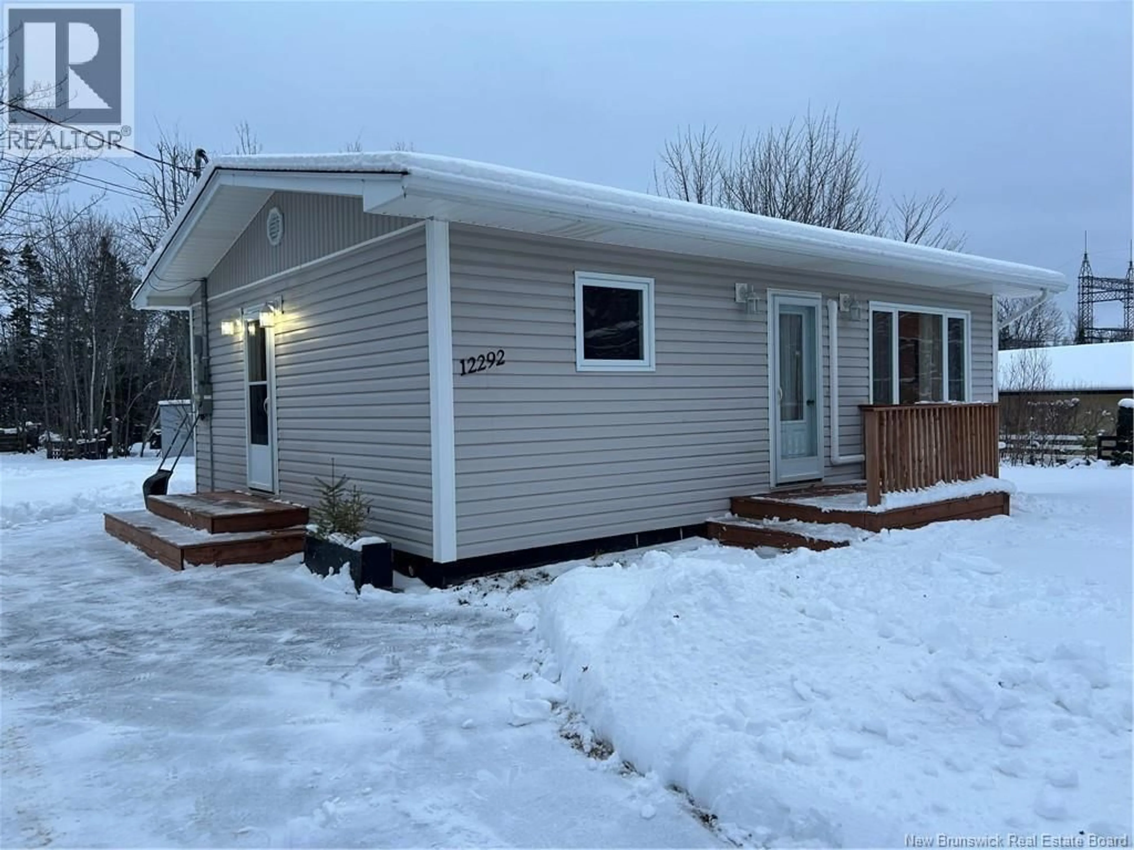 Home with vinyl exterior material, street for 12292 ROUTE 11, Village-Blanchard New Brunswick E8P1S1