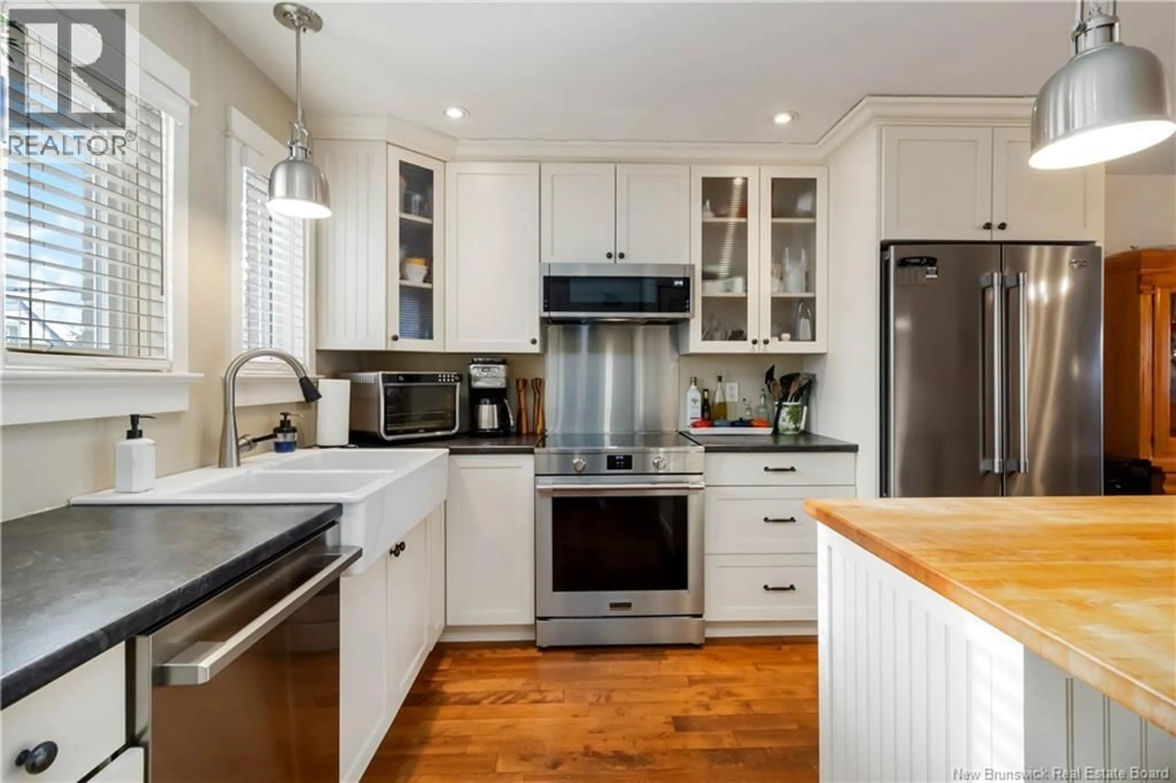 Open concept kitchen, wood/laminate floor for 4 - 60 WESTMOUNT BOULEVARD, Moncton New Brunswick E1E4G8