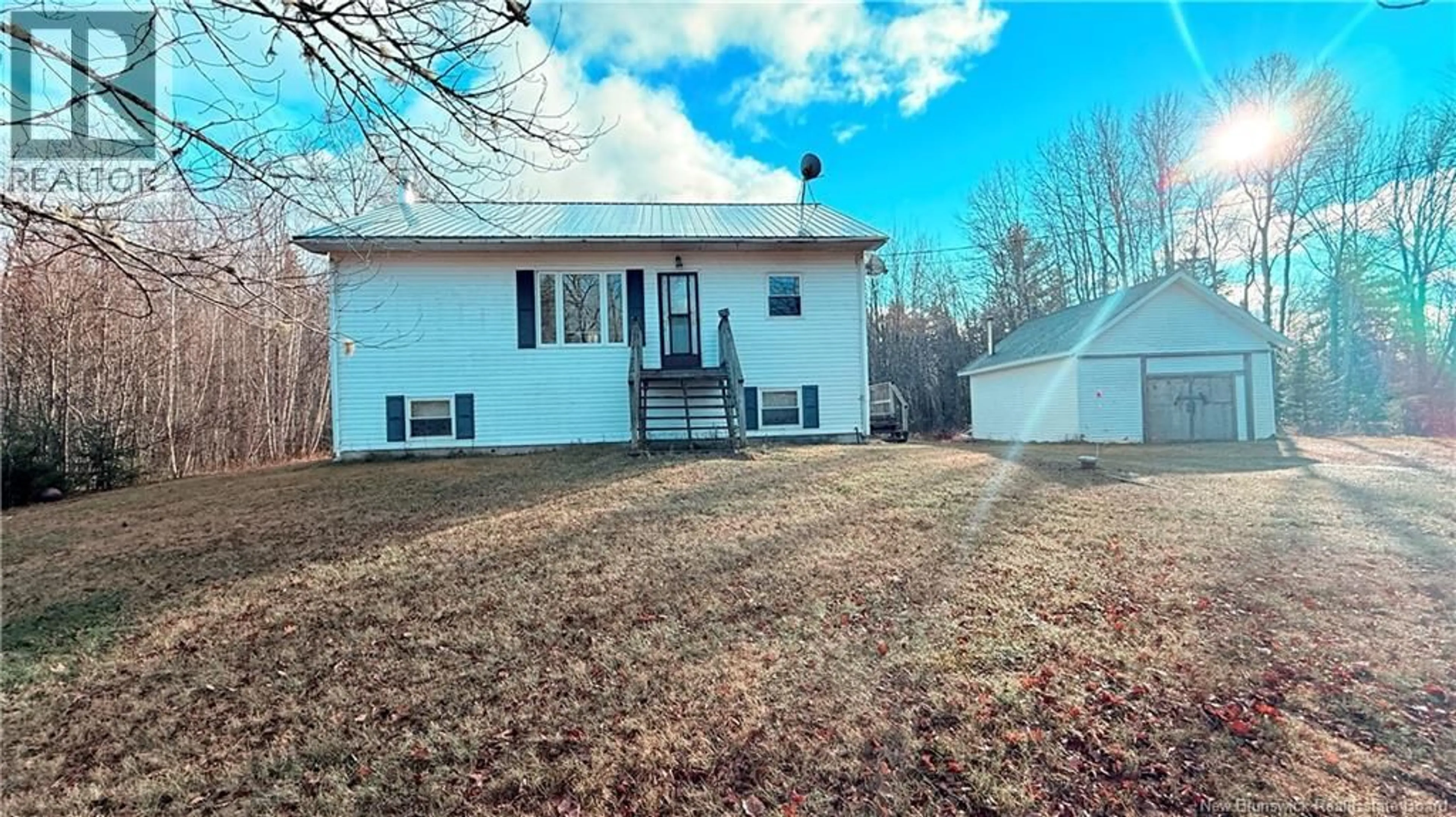 A pic from outside/outdoor area/front of a property/back of a property/a pic from drone, street for 203 NEW ENGLAND SETTLEMENT ROAD, New England Settlement New Brunswick E4B3S6