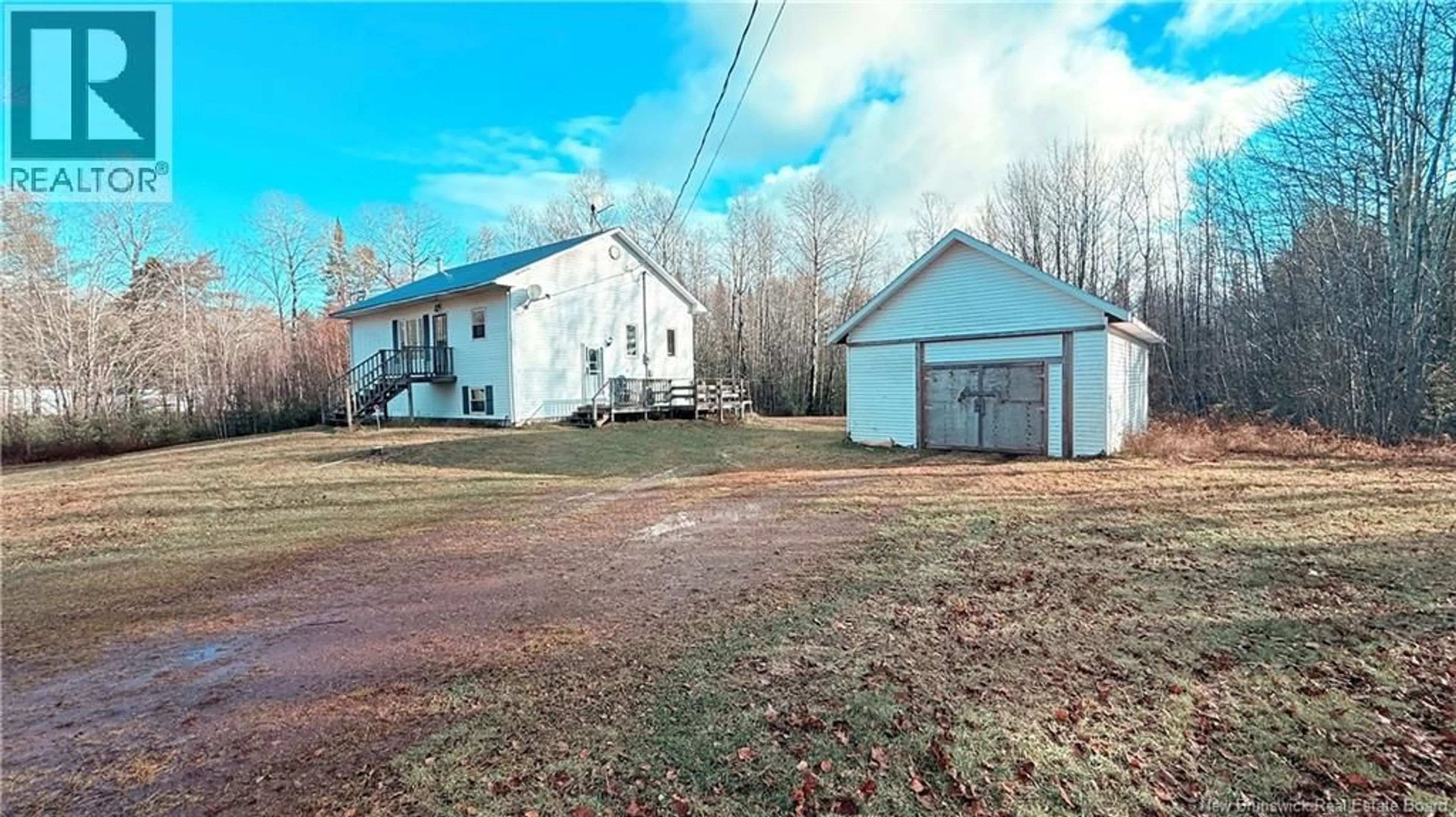 A pic from outside/outdoor area/front of a property/back of a property/a pic from drone, building for 203 NEW ENGLAND SETTLEMENT ROAD, New England Settlement New Brunswick E4B3S6