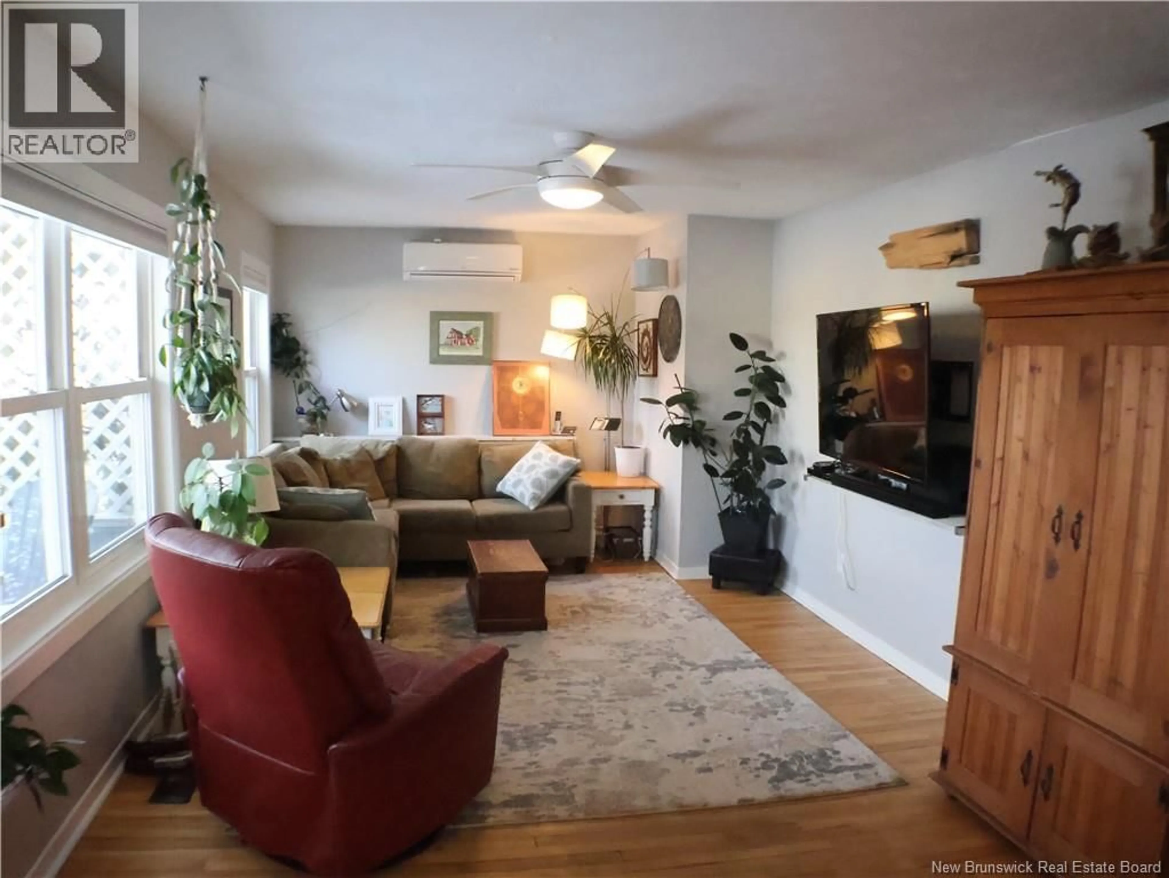 Living room with furniture, unknown for 32 CONNAUGHT AVENUE, Moncton New Brunswick E1C3N5