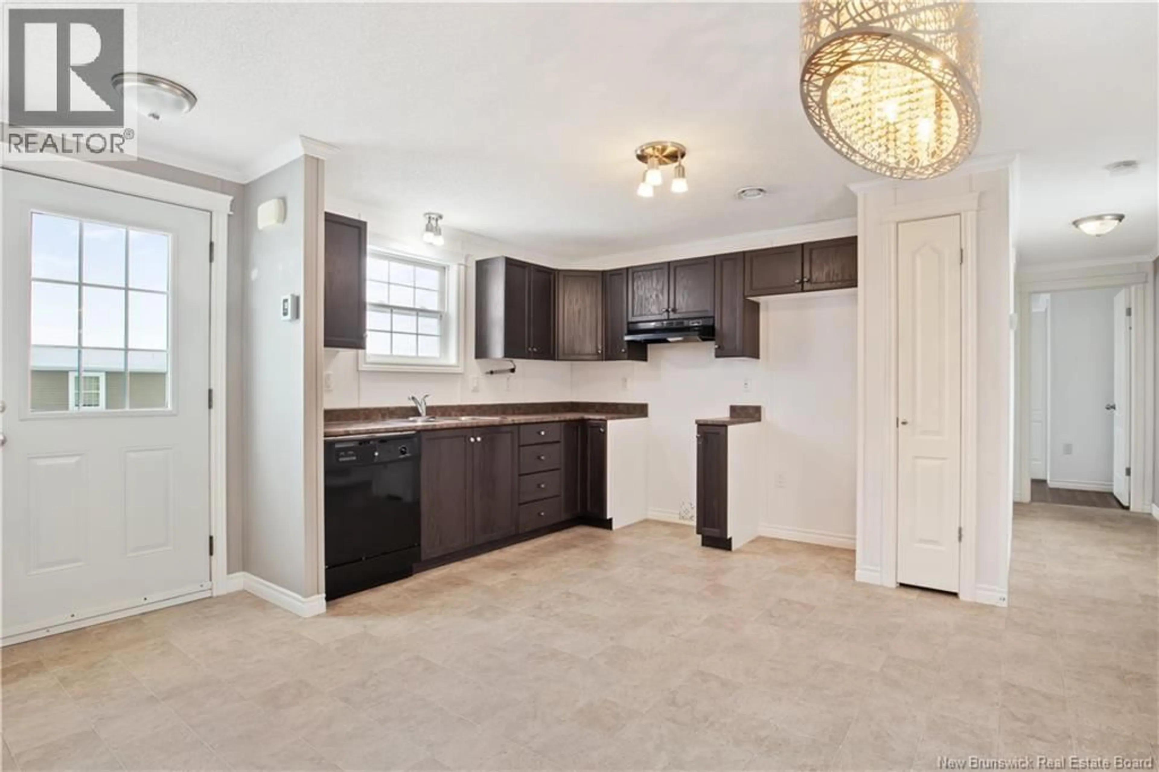 Open concept kitchen, ceramic/tile floor for 396 NEPISIGUIT DRIVE, Dieppe New Brunswick E1A0P6