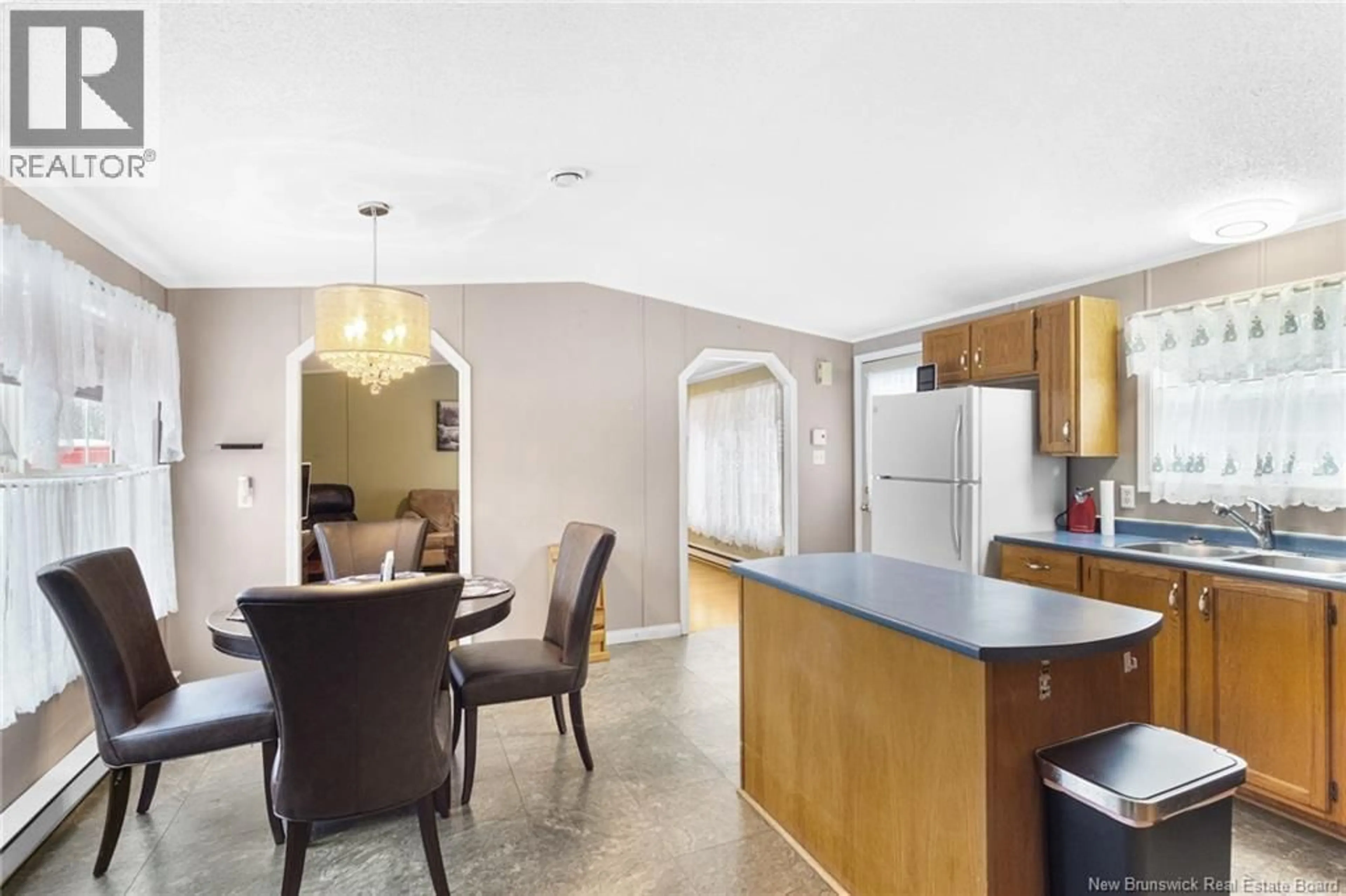 Open concept kitchen, ceramic/tile floor for 60 MEMORIAL DRIVE, Minto New Brunswick E4B3L3