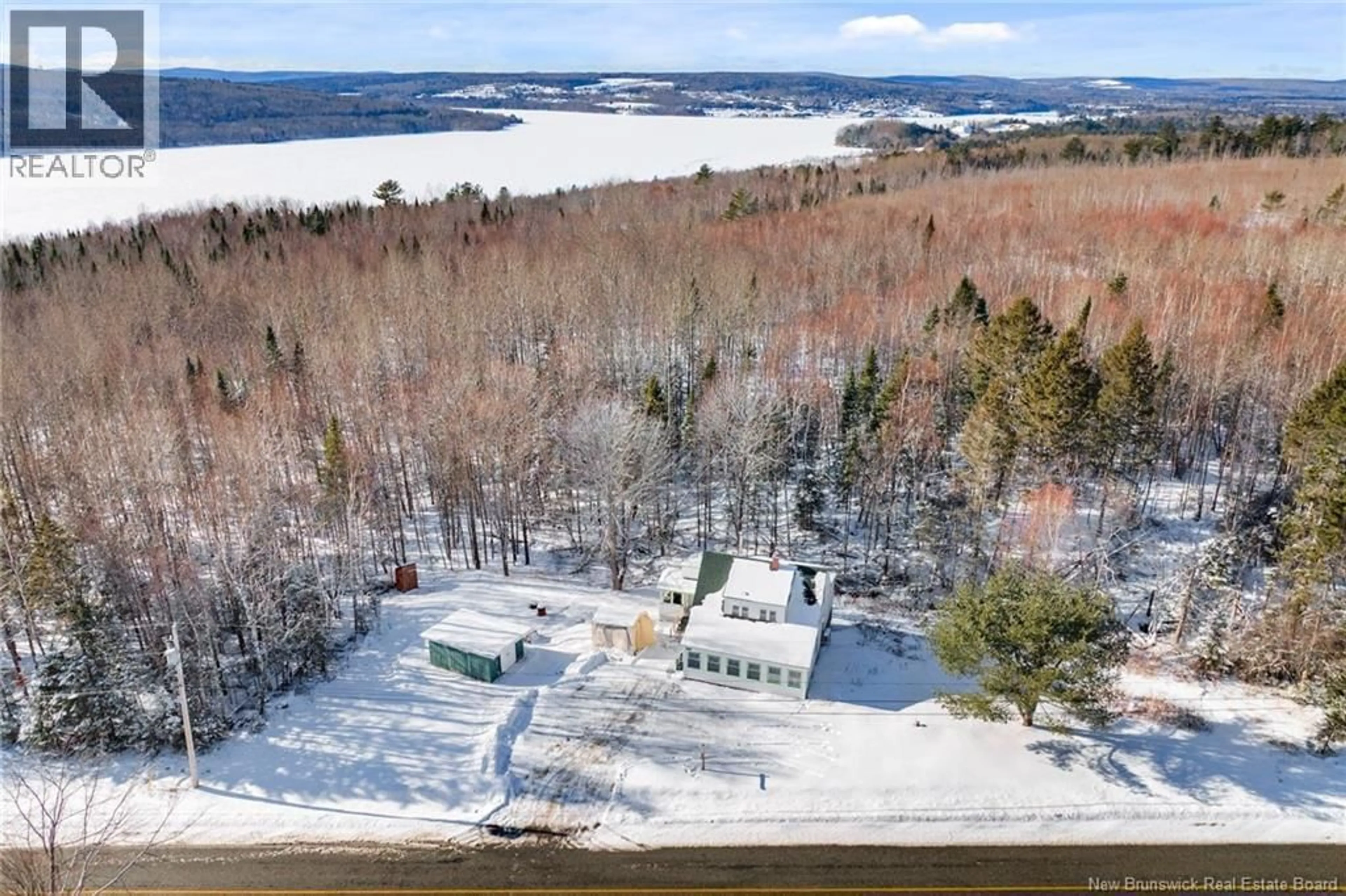 A pic from outside/outdoor area/front of a property/back of a property/a pic from drone, water/lake/river/ocean view for 1200 RTE 610, Upper Queensbury New Brunswick E6G1Y7