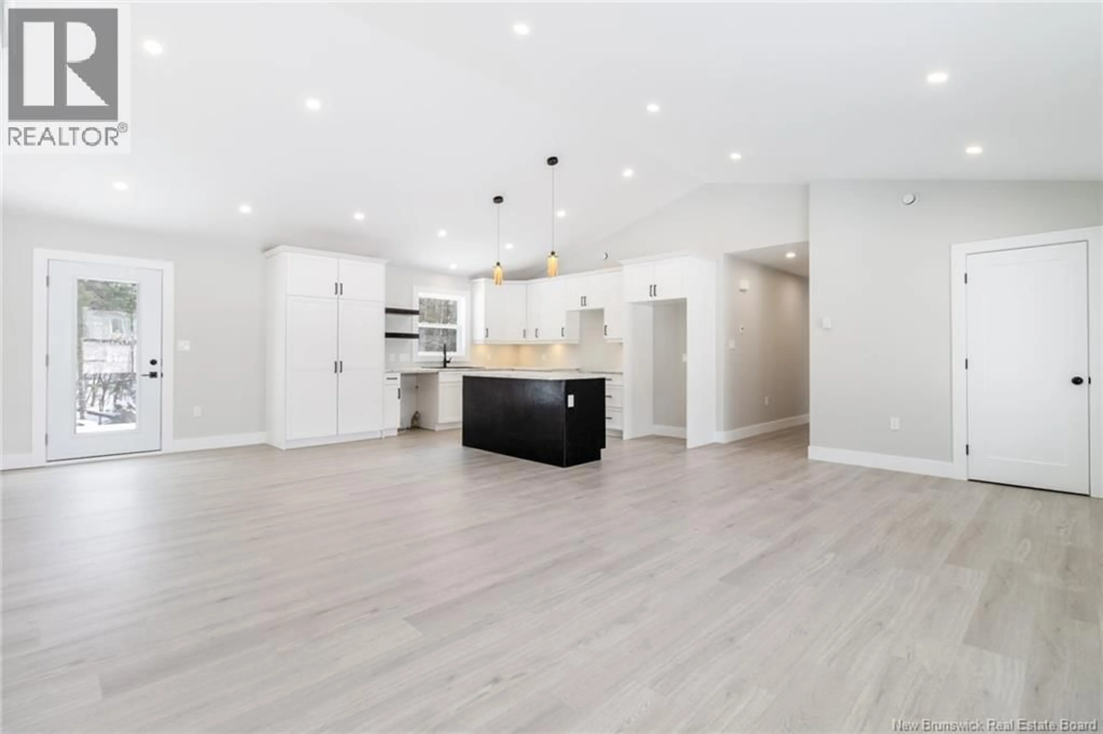 Open concept kitchen, wood/laminate floor for 90 SHIELDS STREET, Douglas New Brunswick E3G0J8