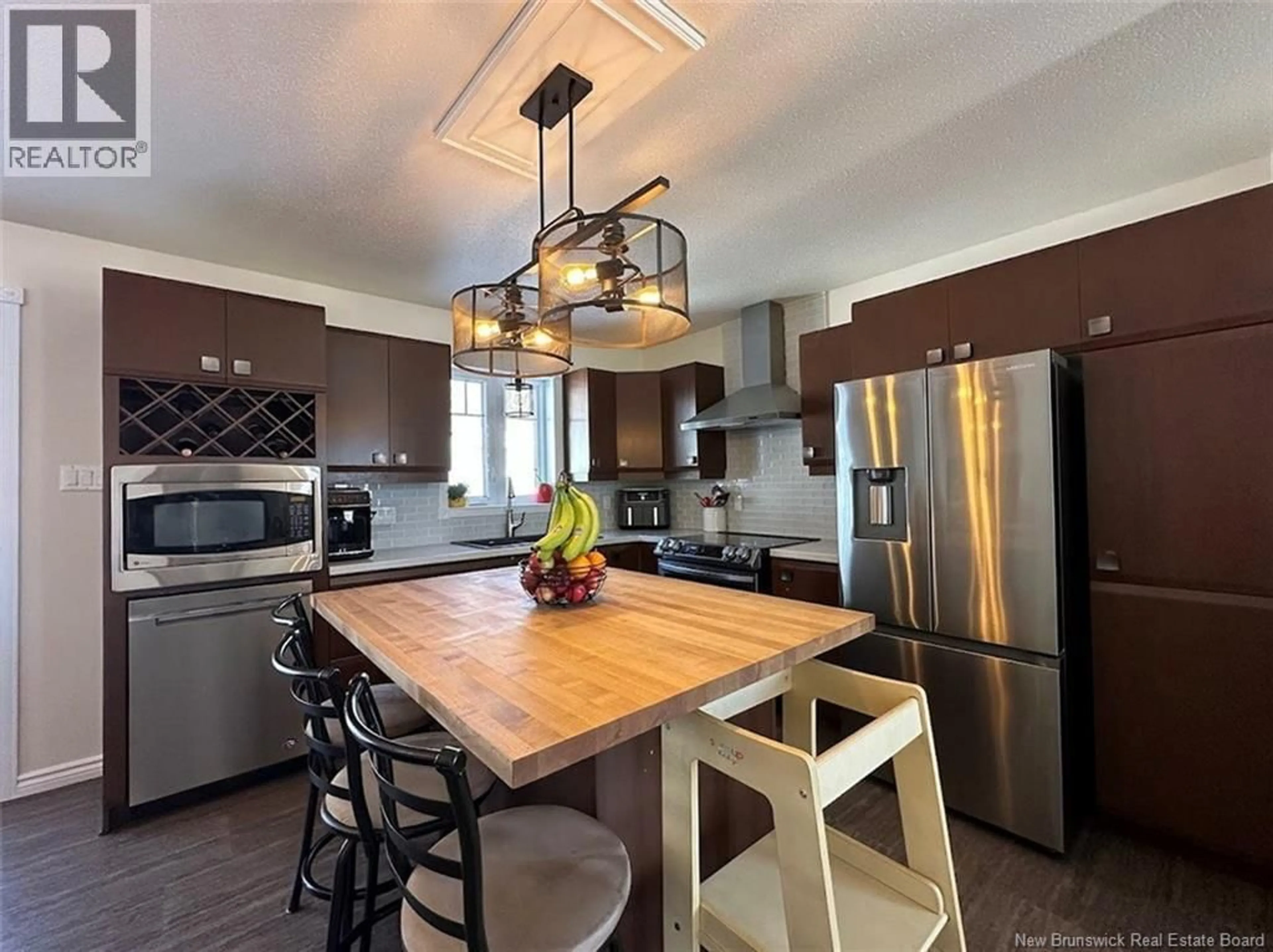 Open concept kitchen, wood/laminate floor for 51 AQUEDUC STREET, Saint-Jacques New Brunswick E7B1R1