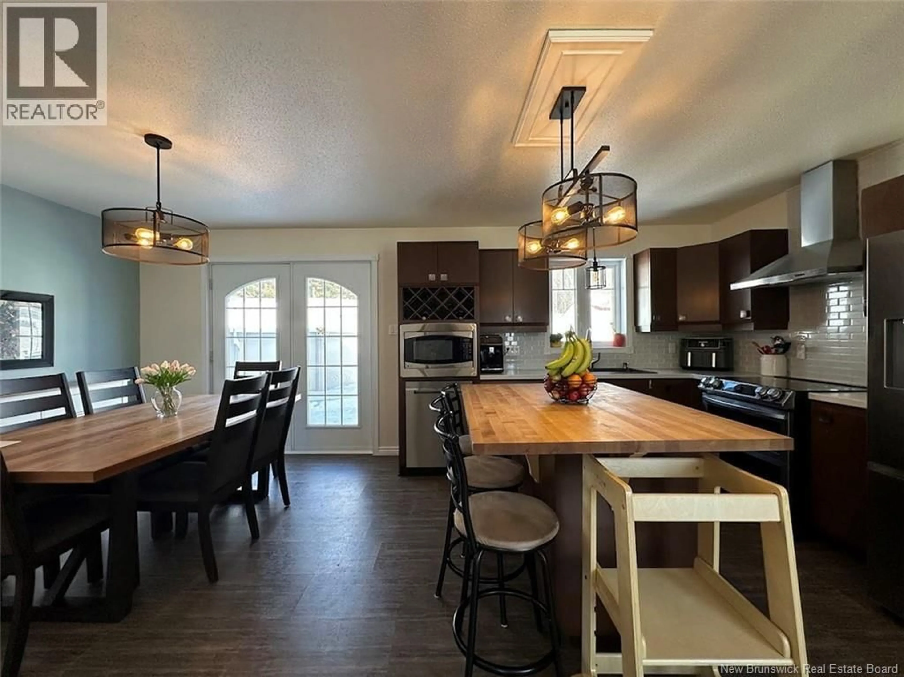 Open concept kitchen, wood/laminate floor for 51 AQUEDUC STREET, Saint-Jacques New Brunswick E7B1R1