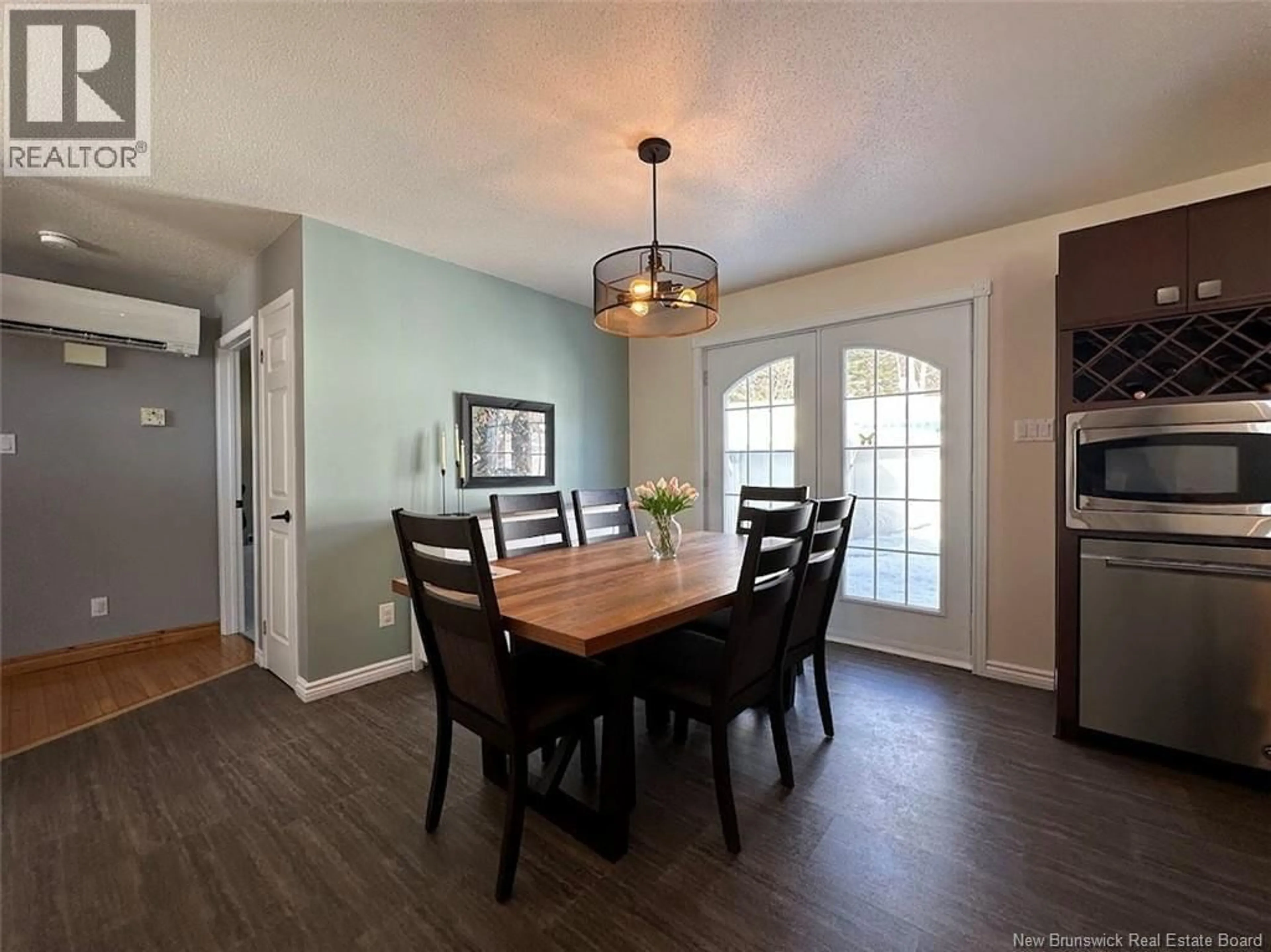 Dining room, wood/laminate floor for 51 AQUEDUC STREET, Saint-Jacques New Brunswick E7B1R1