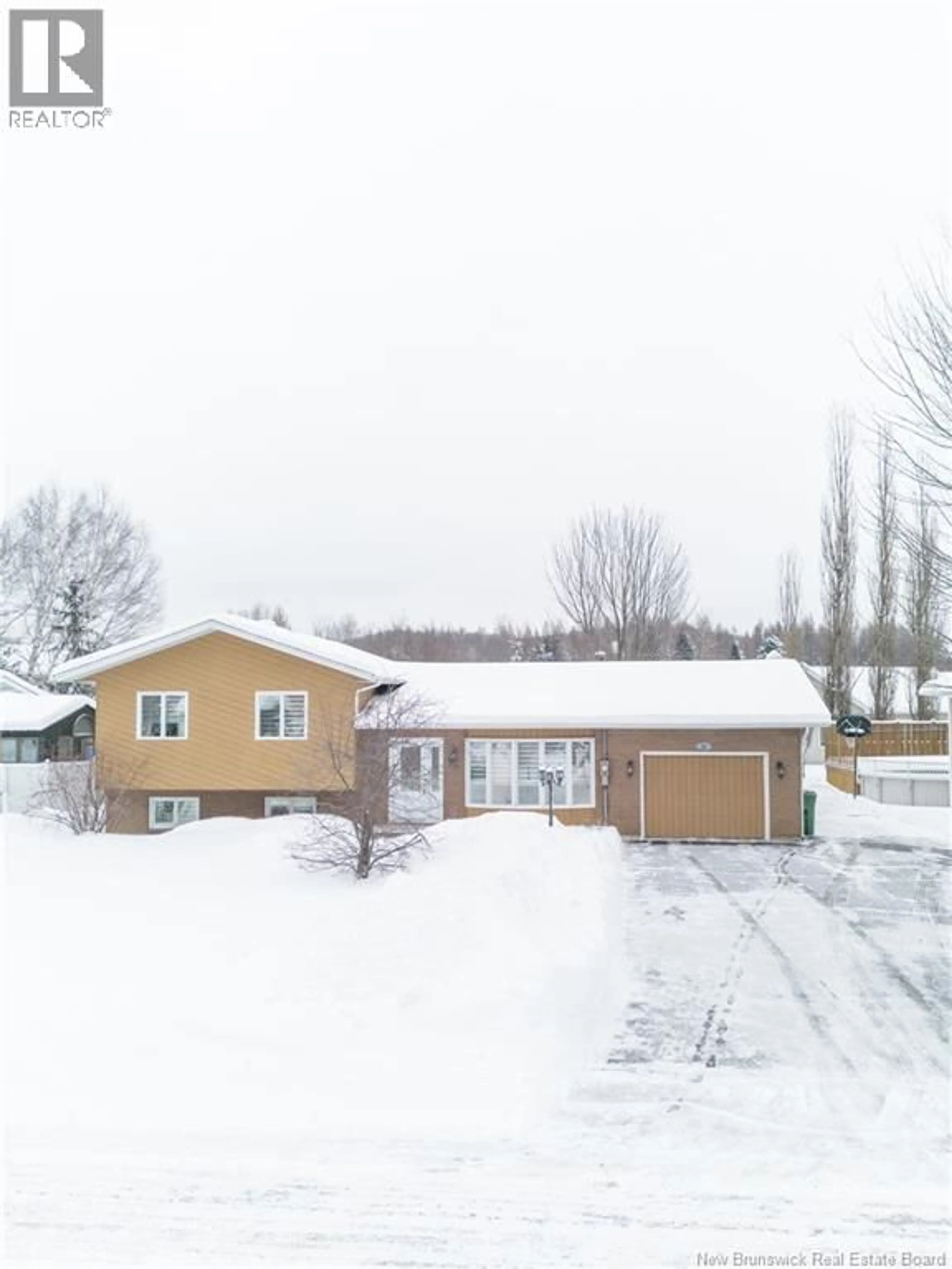 A pic from outside/outdoor area/front of a property/back of a property/a pic from drone, street for 76 LEBLOND STREET, Edmundston New Brunswick E3V4L2