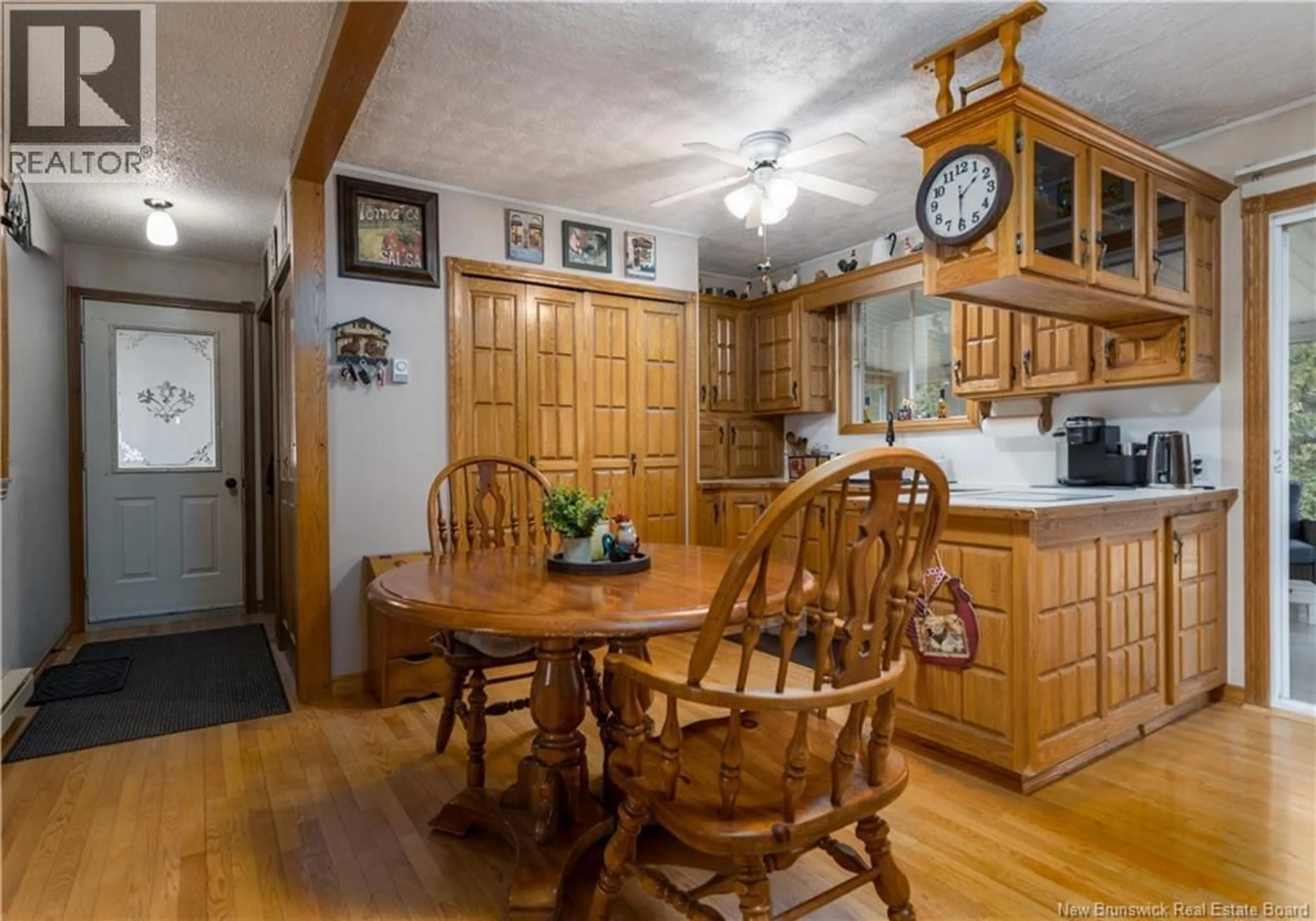 Dining room, wood/laminate floor for 12 COLEBROOKE ROAD, Grand-Sault/Grand Falls New Brunswick E3Z1A8
