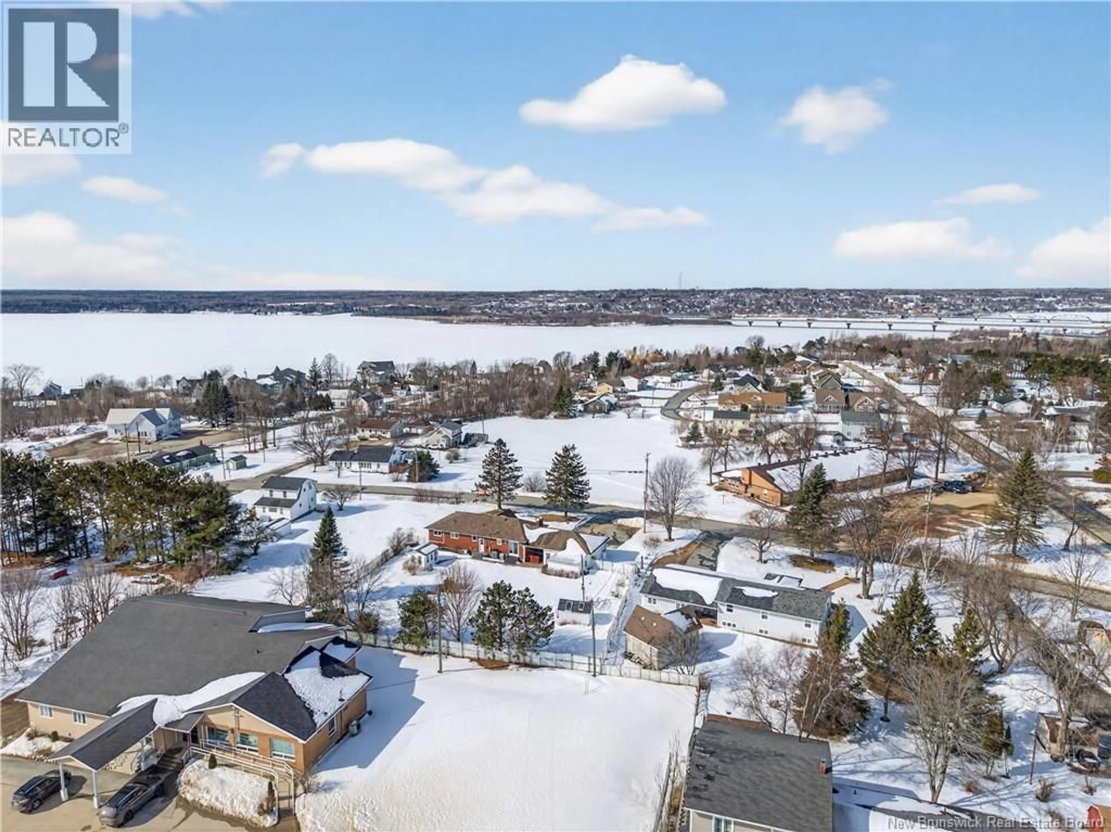 A pic from outside/outdoor area/front of a property/back of a property/a pic from drone, water/lake/river/ocean view for 12 OLDLINE AVENUE, Miramichi New Brunswick E1N5Y3